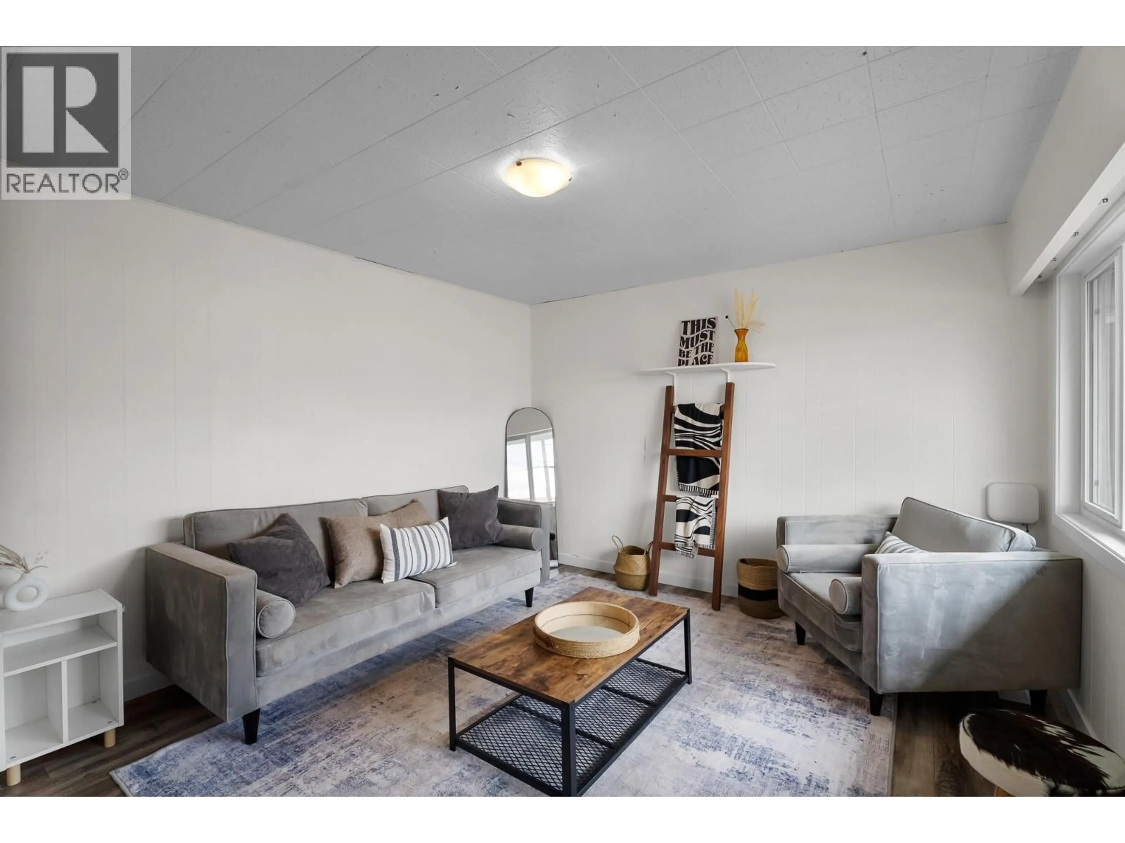 Living room with furniture, unknown for 2564 COUTLEE AVENUE, Merritt British Columbia V1K1B8