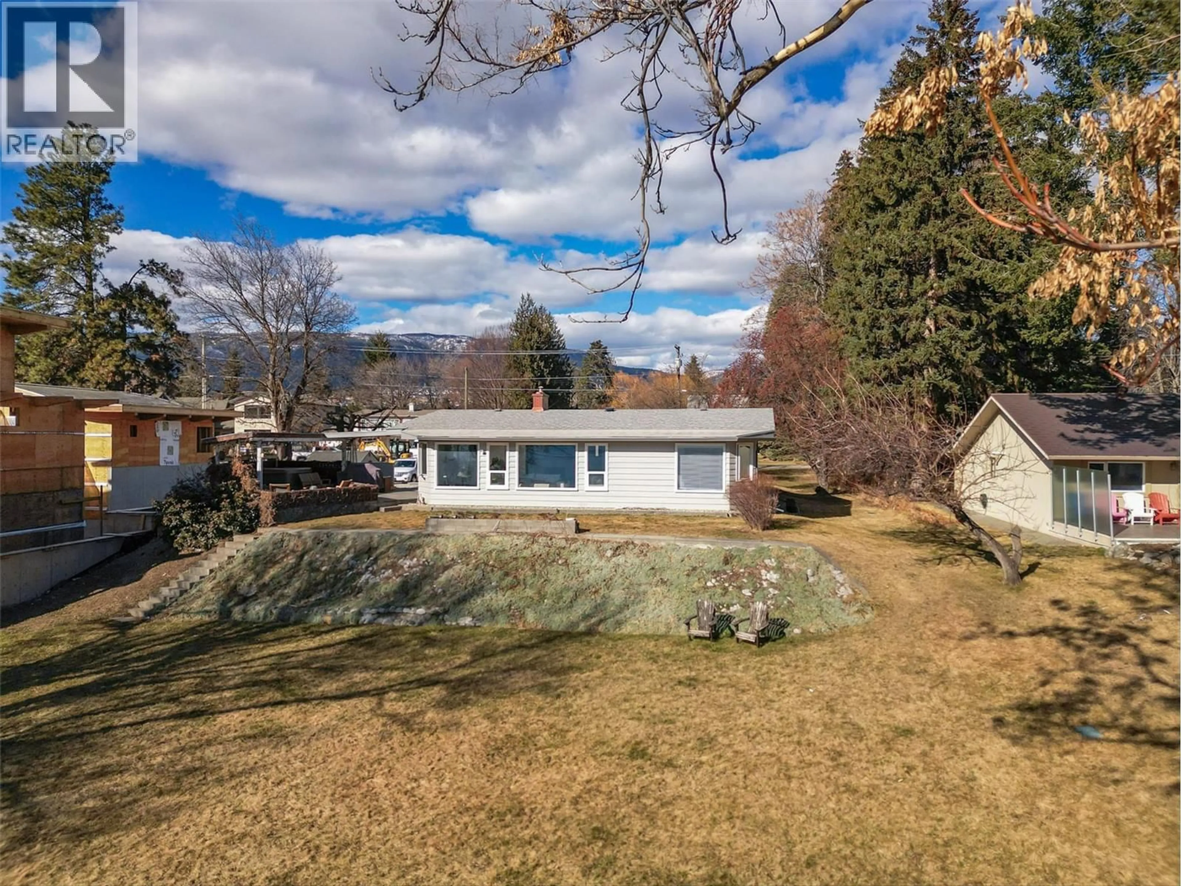 A pic from outside/outdoor area/front of a property/back of a property/a pic from drone, unknown for 1879 JENNENS ROAD, West Kelowna British Columbia V4T2C9
