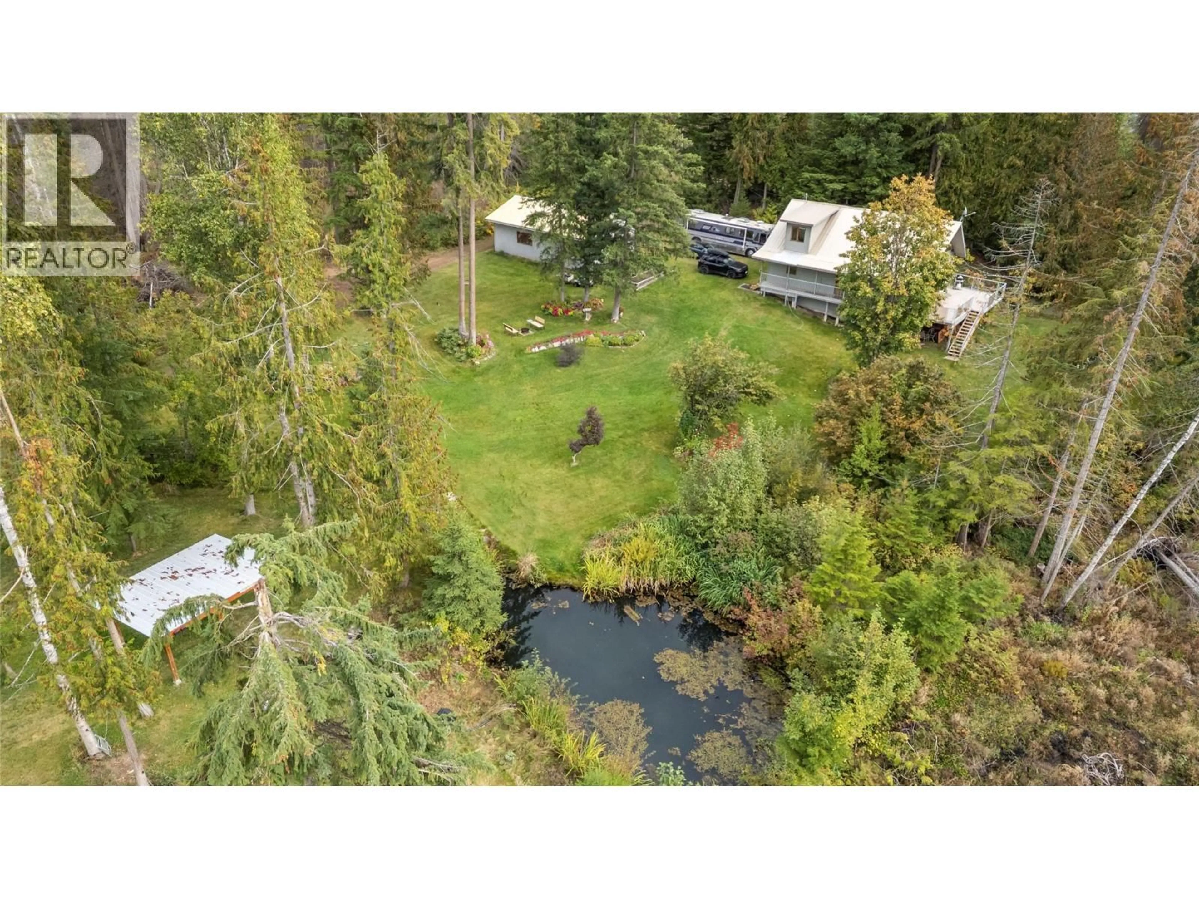 A pic from outside/outdoor area/front of a property/back of a property/a pic from drone, forest/trees view for 2849 GARLAND ROAD, Celista British Columbia V0E1M6