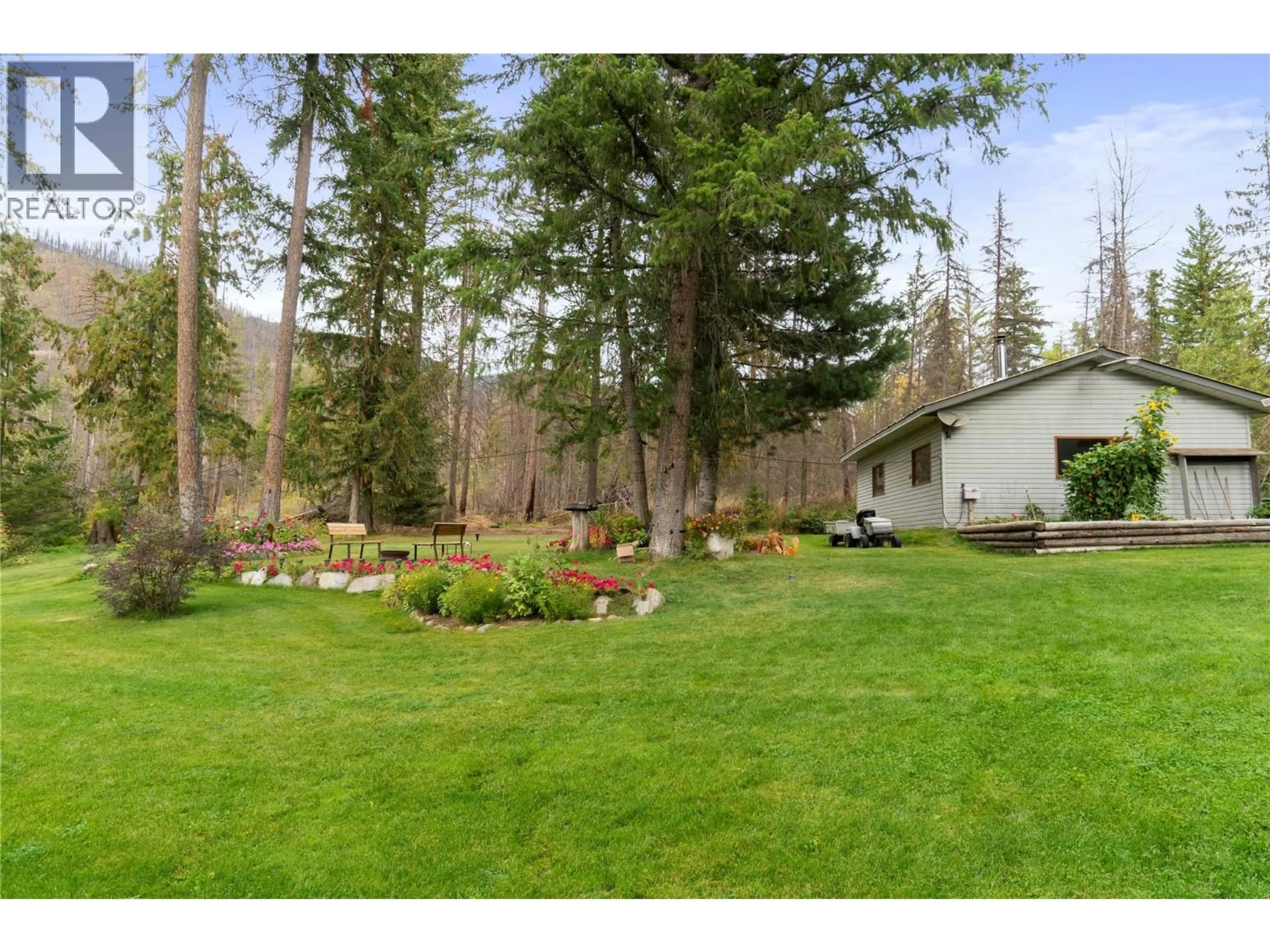 A pic from outside/outdoor area/front of a property/back of a property/a pic from drone, forest/trees view for 2849 GARLAND ROAD, Celista British Columbia V0E1M6