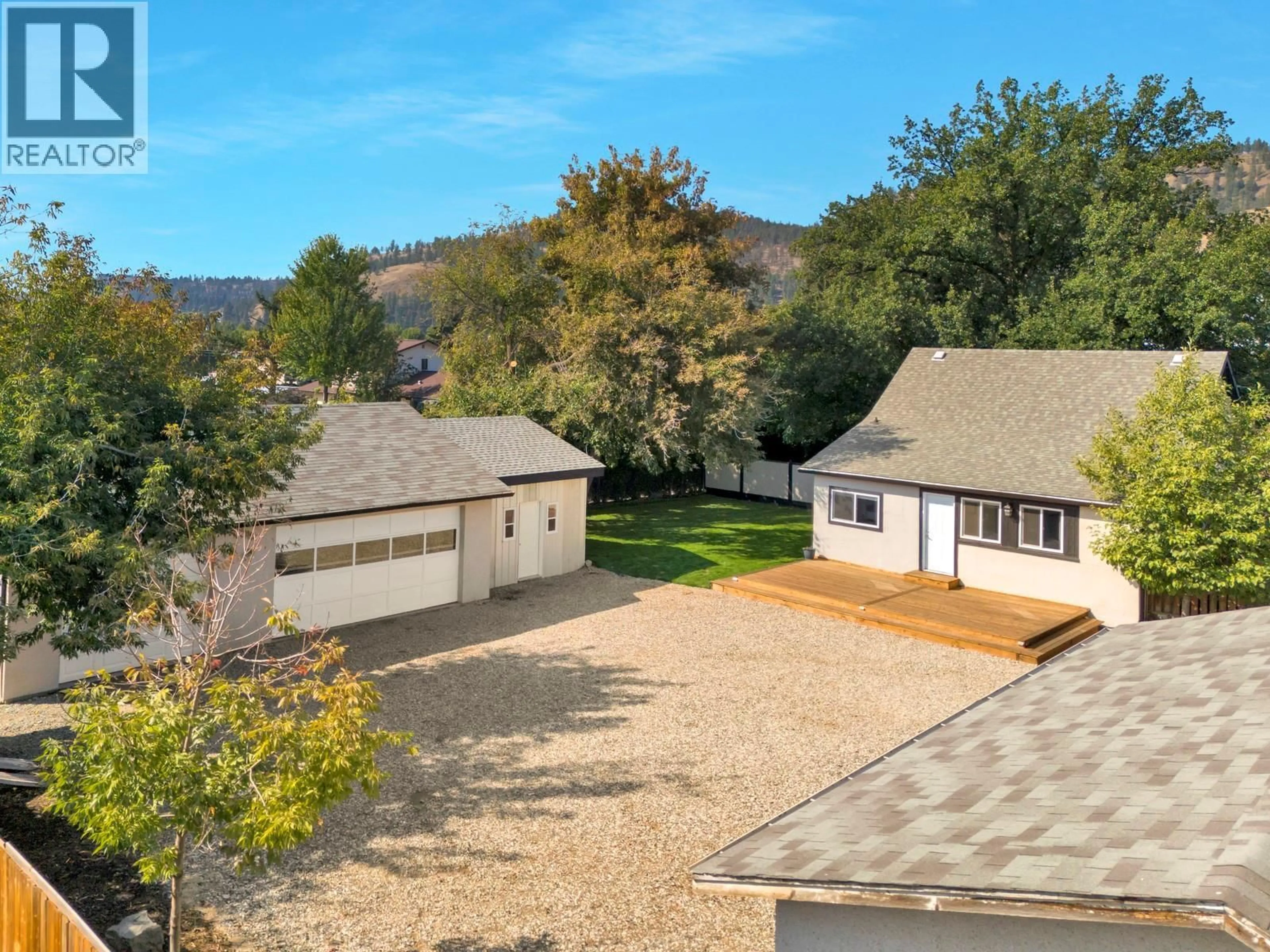 A pic from outside/outdoor area/front of a property/back of a property/a pic from drone, mountain view for 431 VALLEY ROAD, Kelowna British Columbia V1V2E5