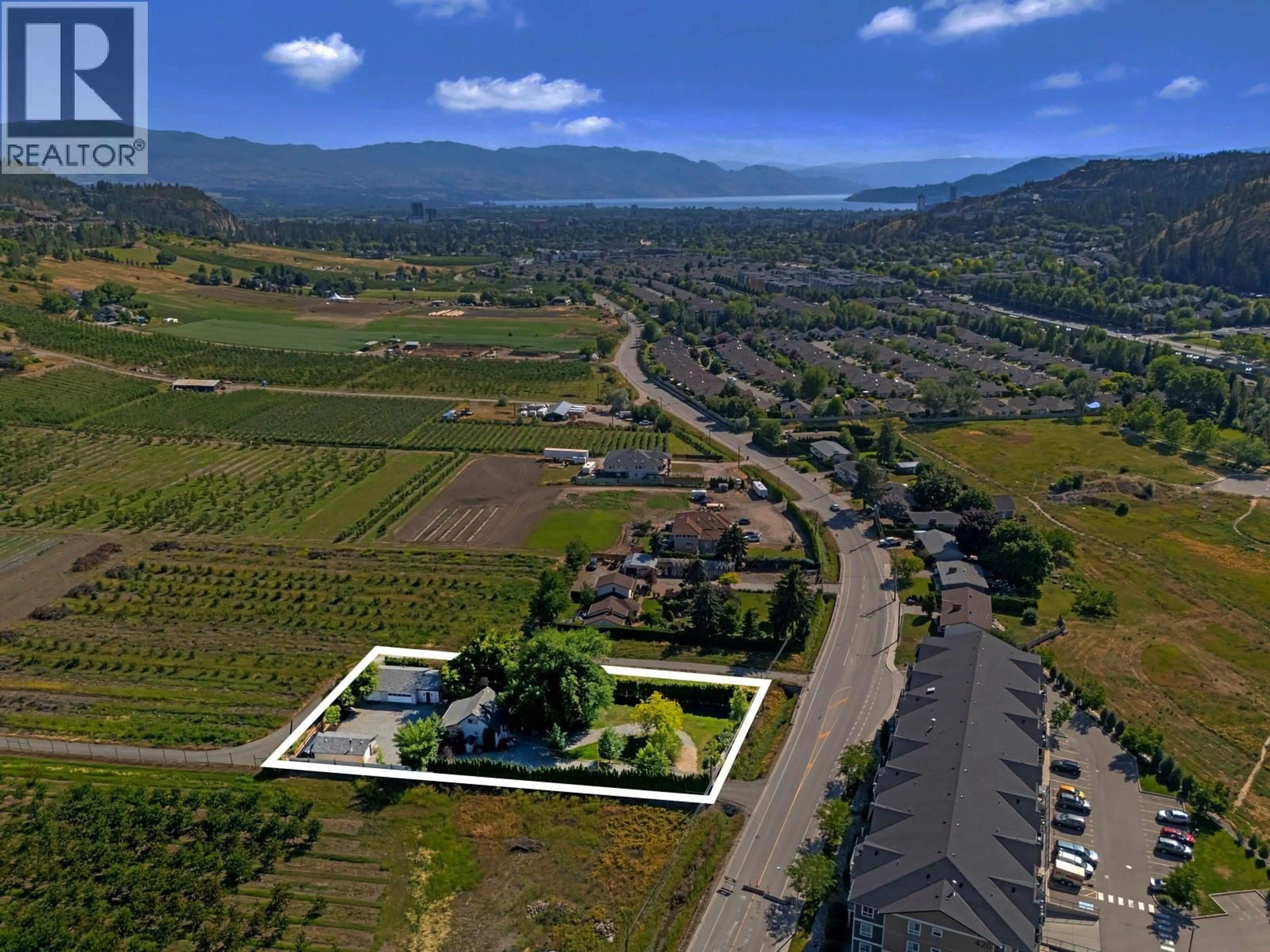 A pic from outside/outdoor area/front of a property/back of a property/a pic from drone, mountain view for 431 VALLEY ROAD, Kelowna British Columbia V1V2E5