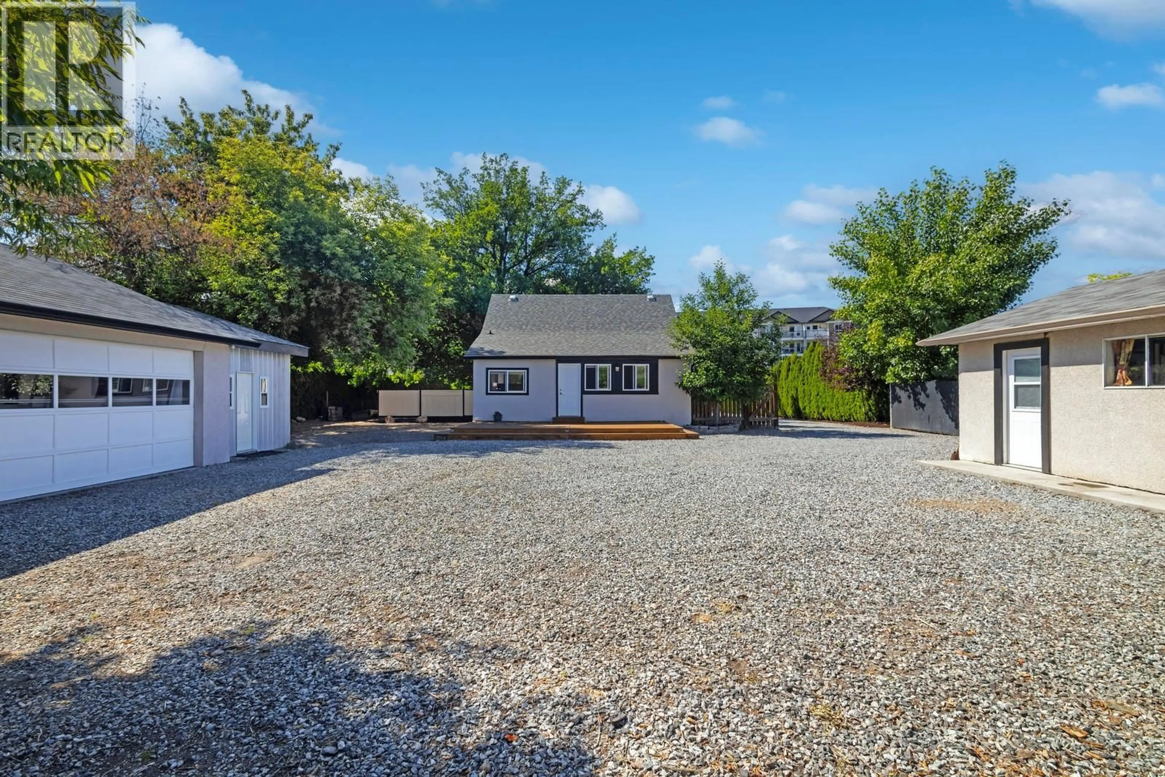 A pic from outside/outdoor area/front of a property/back of a property/a pic from drone, water/lake/river/ocean view for 431 VALLEY ROAD, Kelowna British Columbia V1V2E5