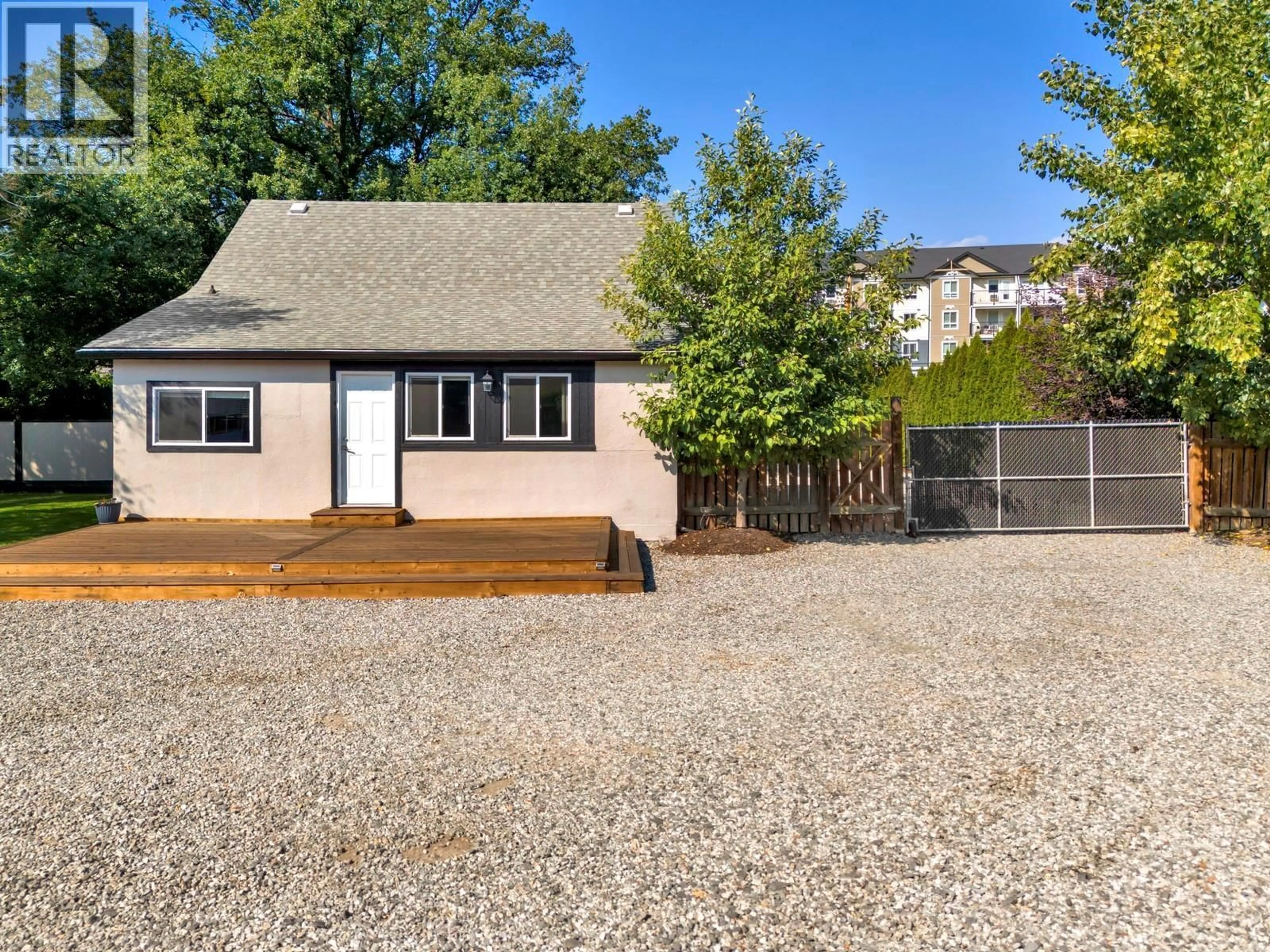 A pic from outside/outdoor area/front of a property/back of a property/a pic from drone, street for 431 VALLEY ROAD, Kelowna British Columbia V1V2E5