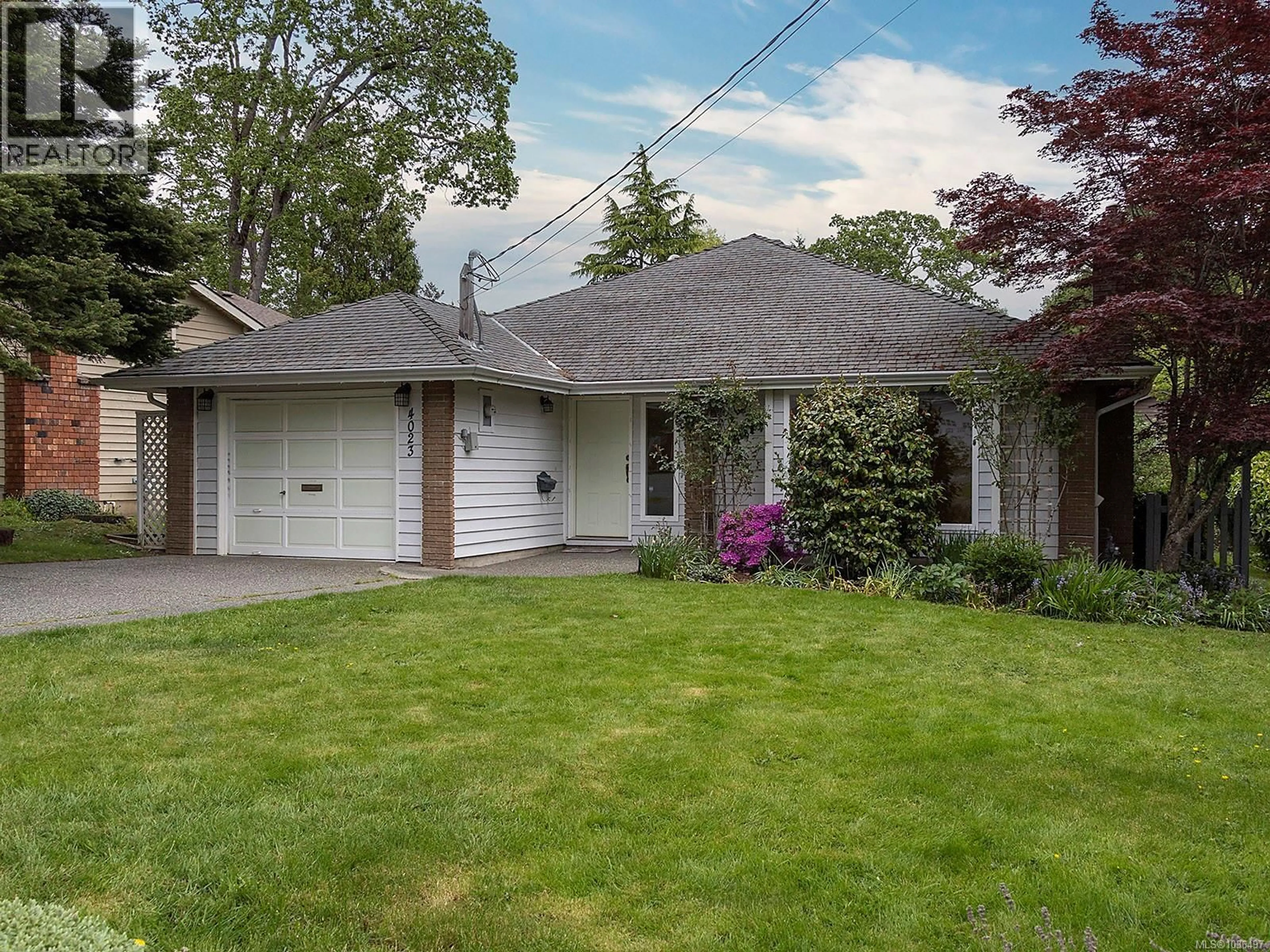 Home with vinyl exterior material, street for 4023 MALTON AVENUE, Saanich British Columbia V8X4W3