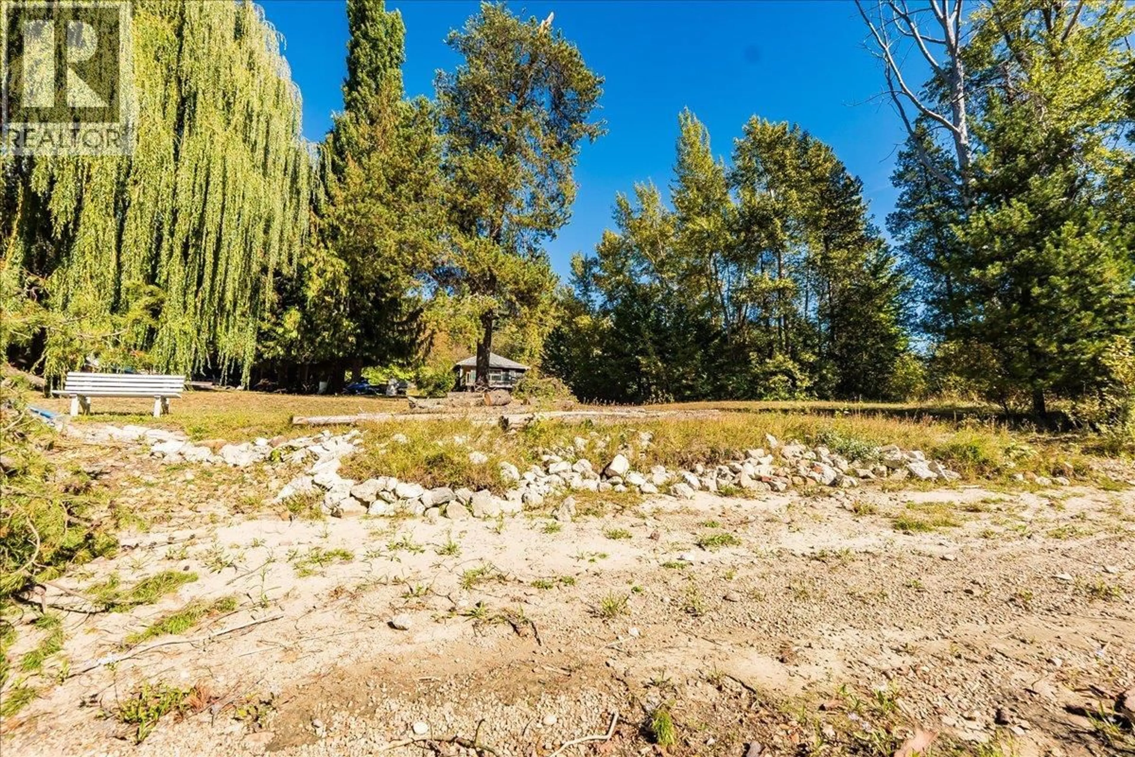 A pic from outside/outdoor area/front of a property/back of a property/a pic from drone, forest/trees view for 3788 BROADWATER ROAD, Castlegar British Columbia V1N4V4