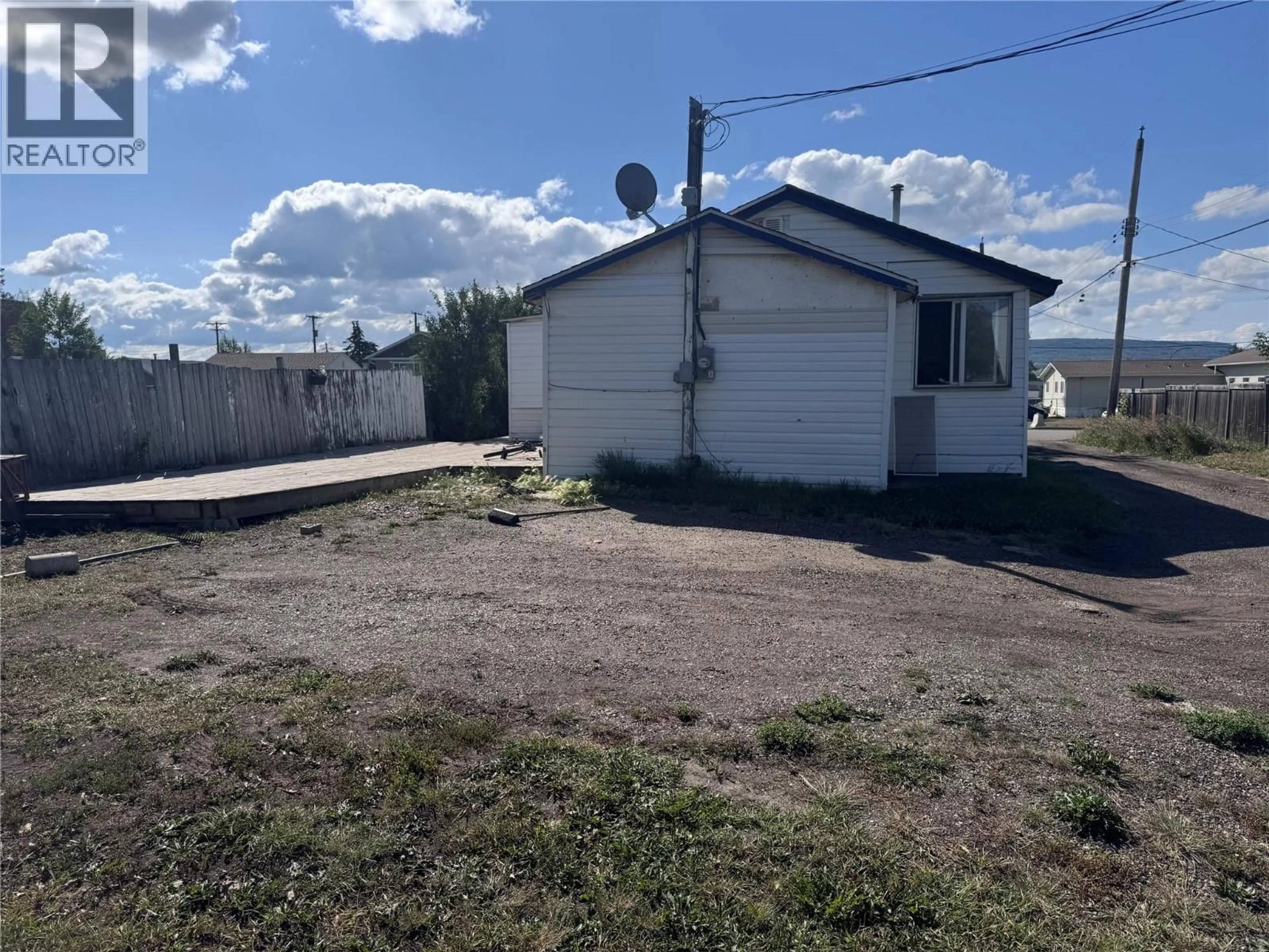 A pic from outside/outdoor area/front of a property/back of a property/a pic from drone, street for 1330 101 AVENUE, Dawson Creek British Columbia V1G1V8