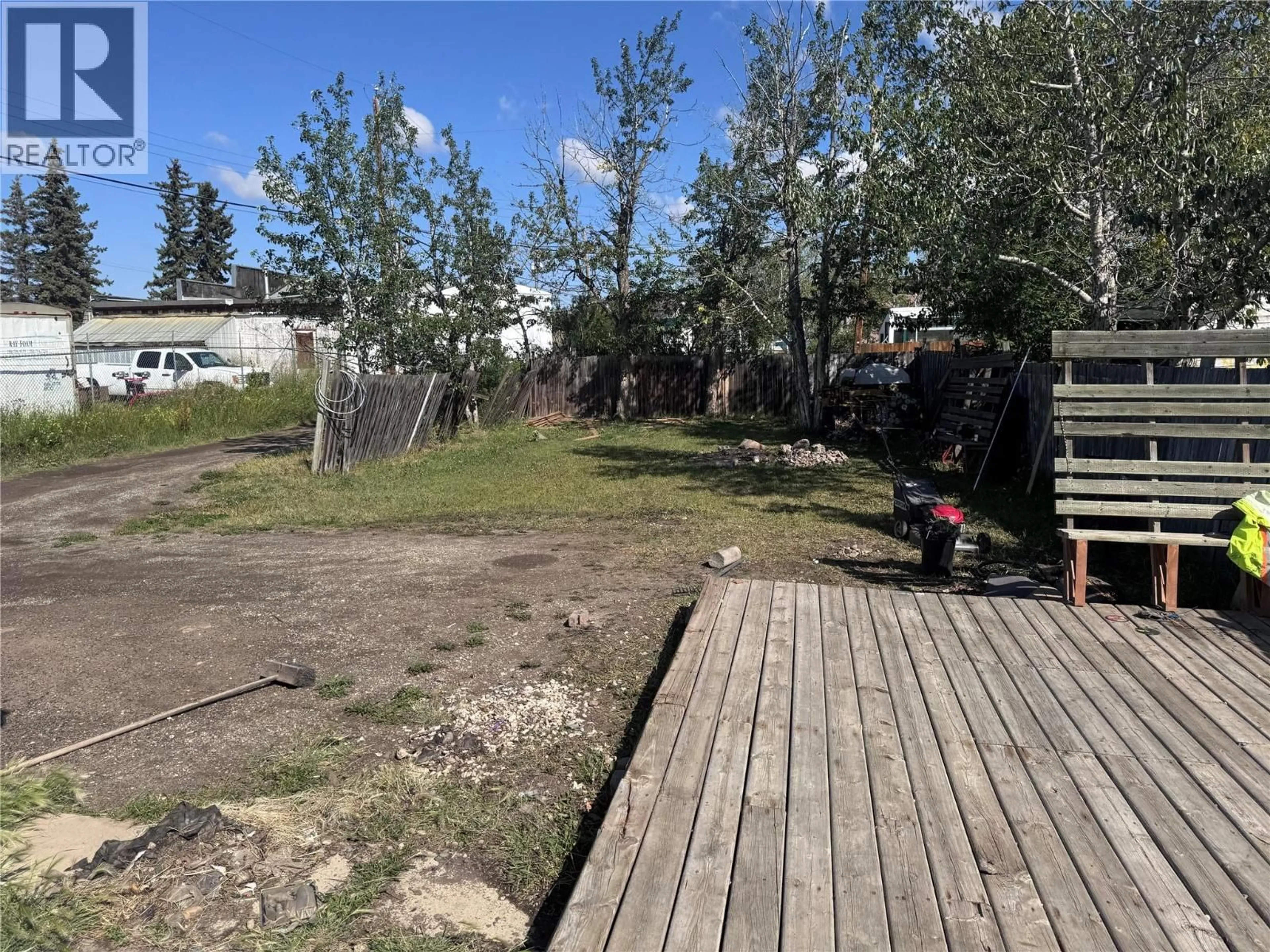 A pic from outside/outdoor area/front of a property/back of a property/a pic from drone, unknown for 1330 101 AVENUE, Dawson Creek British Columbia V1G1V8