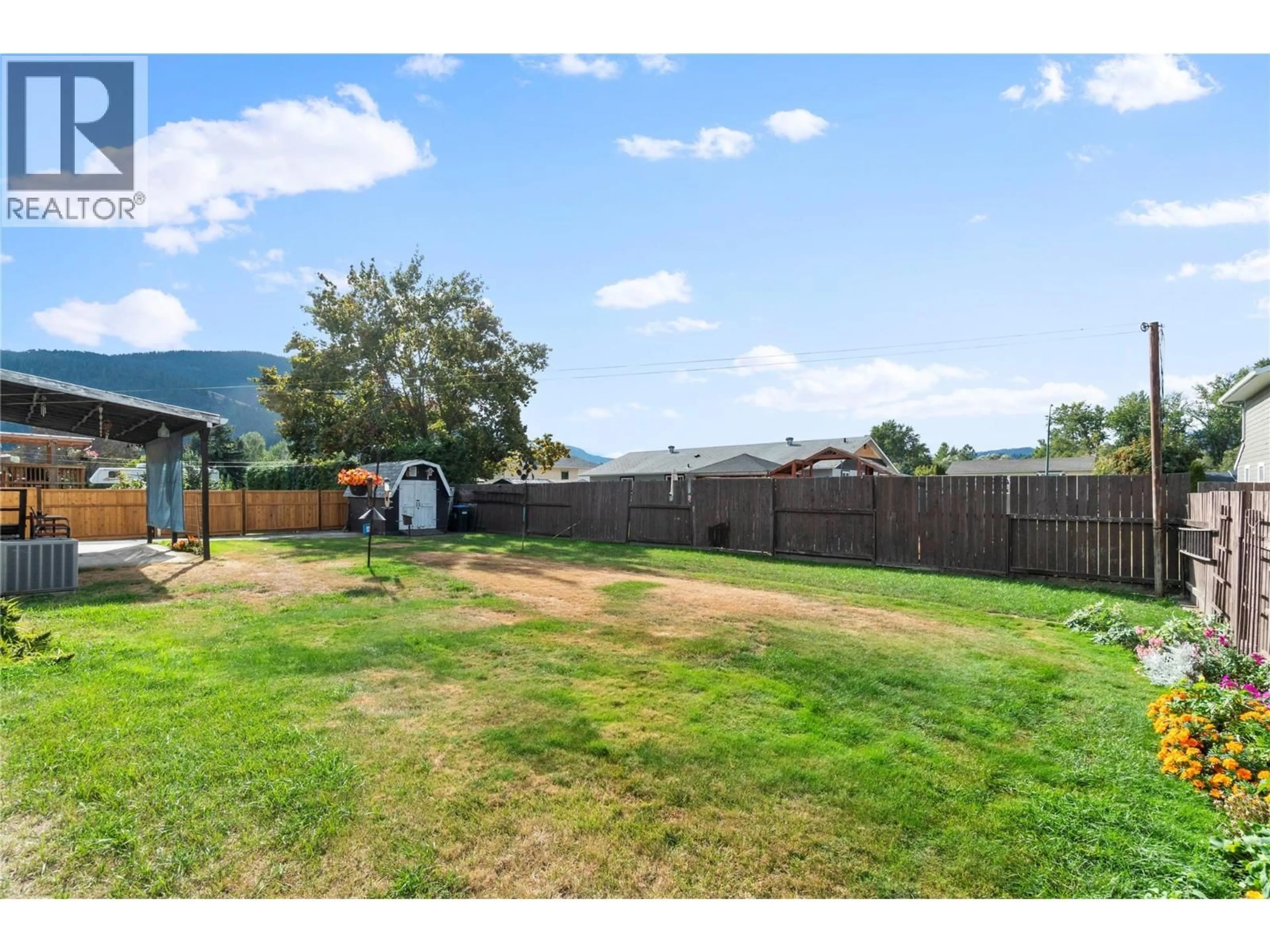 A pic from outside/outdoor area/front of a property/back of a property/a pic from drone, mountain view for 414 PINE STREET, Chase British Columbia V0E1M0
