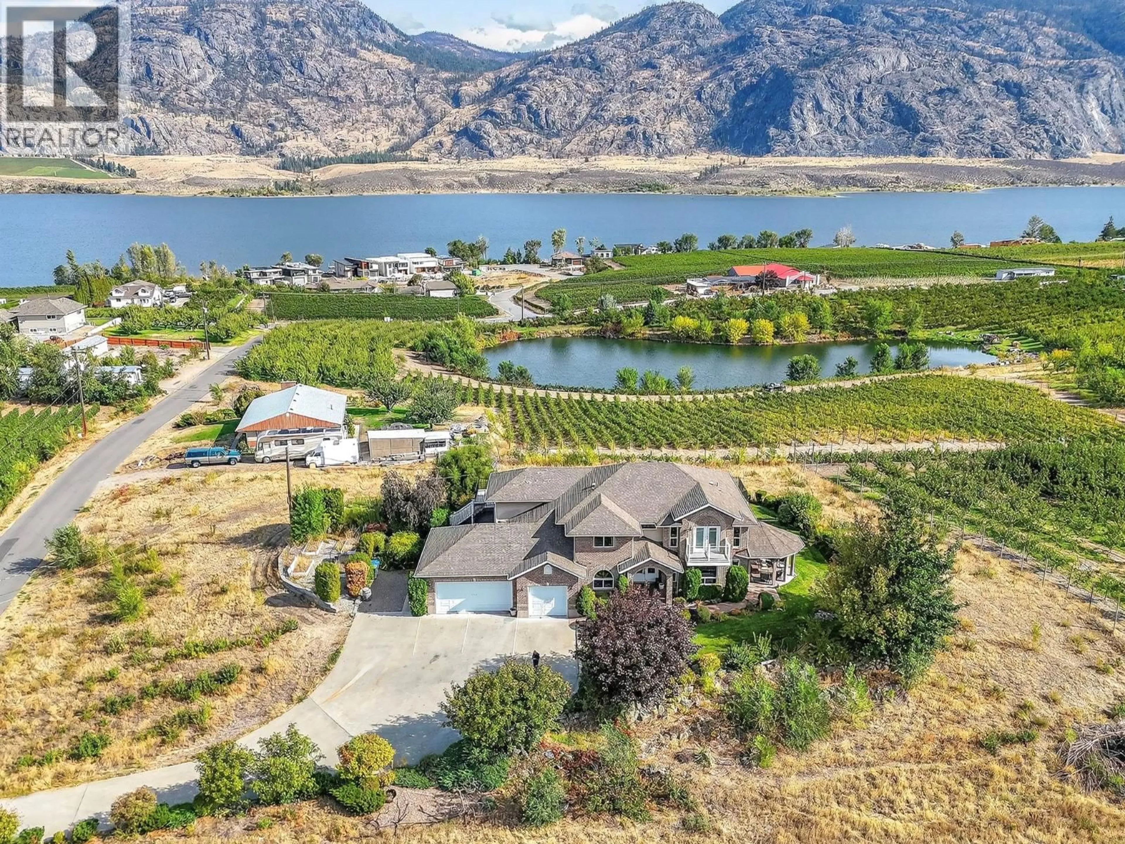 A pic from outside/outdoor area/front of a property/back of a property/a pic from drone, water/lake/river/ocean view for 8949 122ND AVENUE, Osoyoos British Columbia V0H1V2