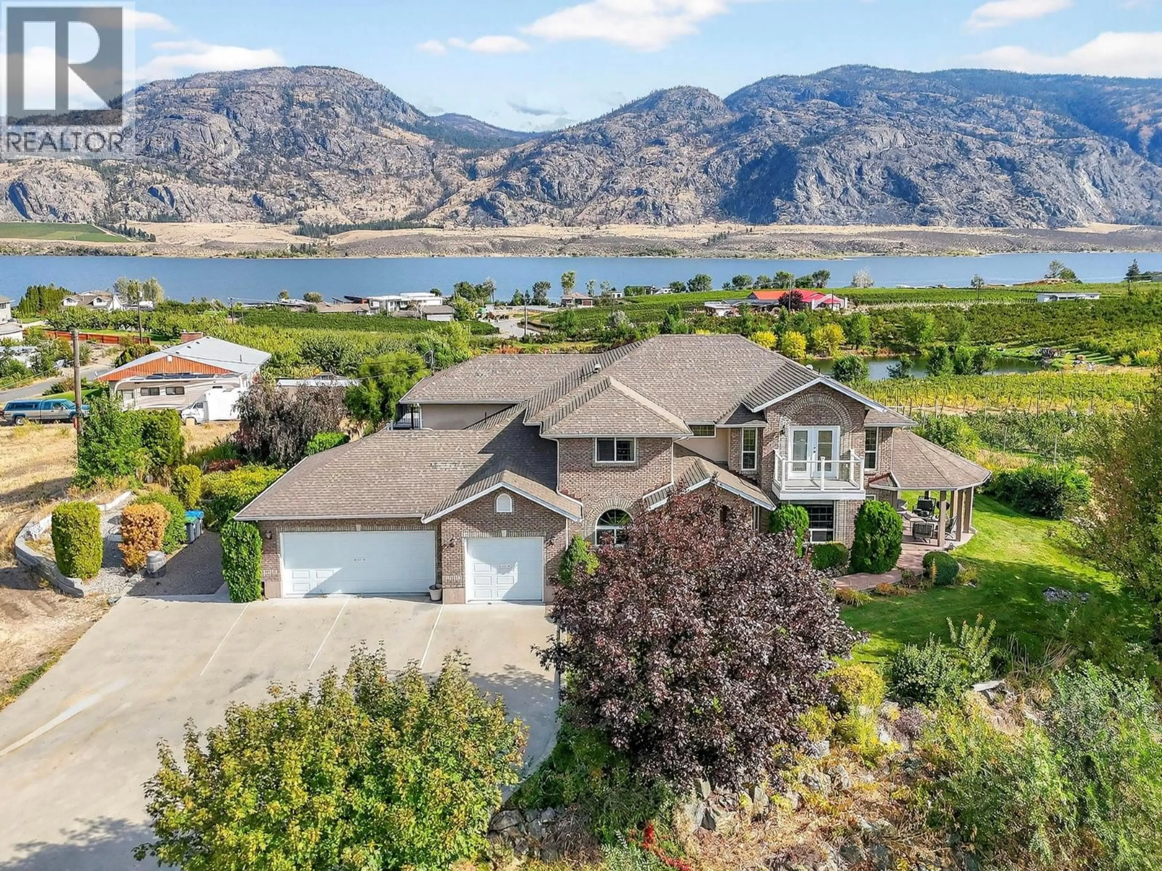A pic from outside/outdoor area/front of a property/back of a property/a pic from drone, water/lake/river/ocean view for 8949 122ND AVENUE, Osoyoos British Columbia V0H1V2