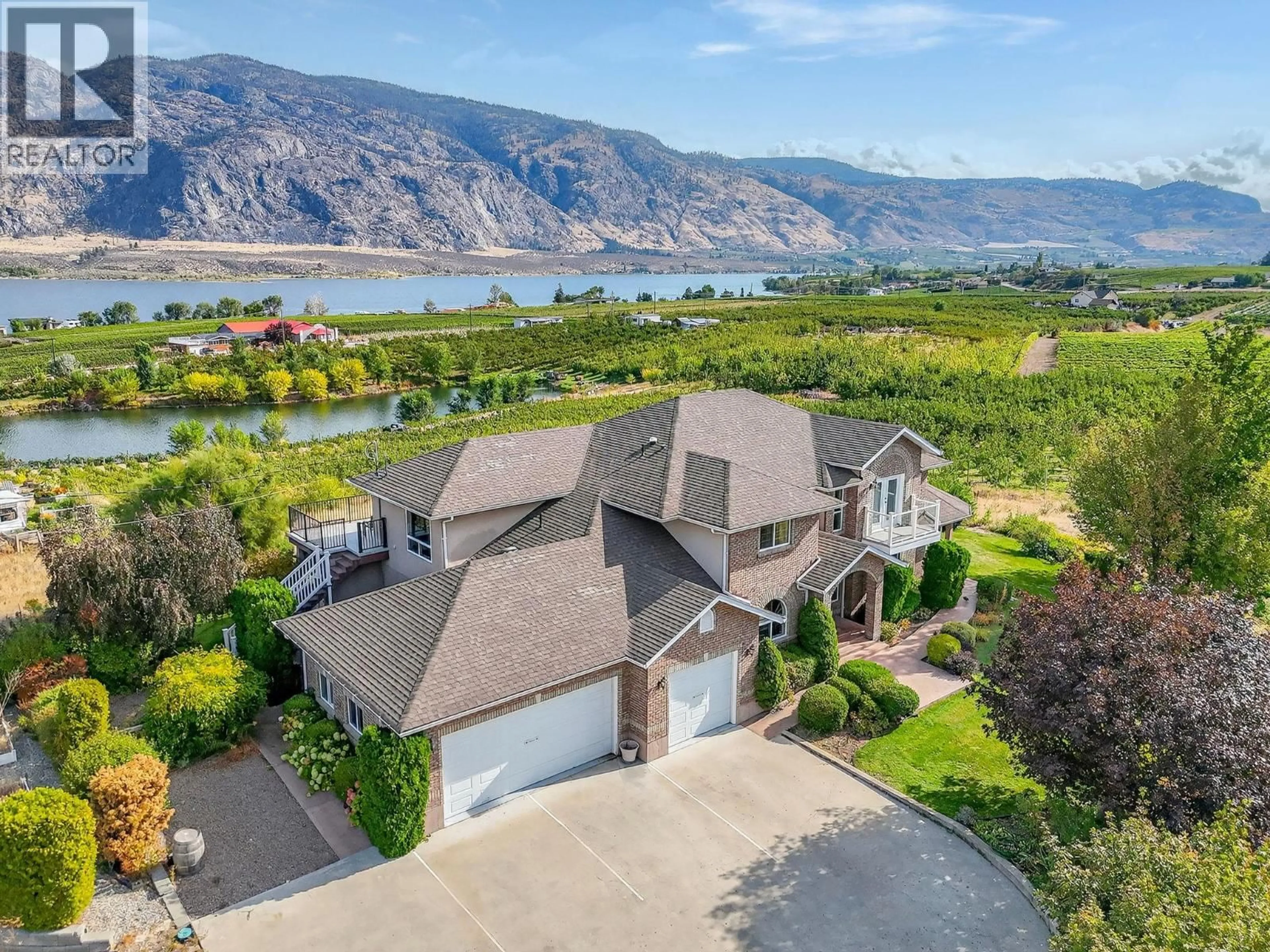 A pic from outside/outdoor area/front of a property/back of a property/a pic from drone, water/lake/river/ocean view for 8949 122ND AVENUE, Osoyoos British Columbia V0H1V2