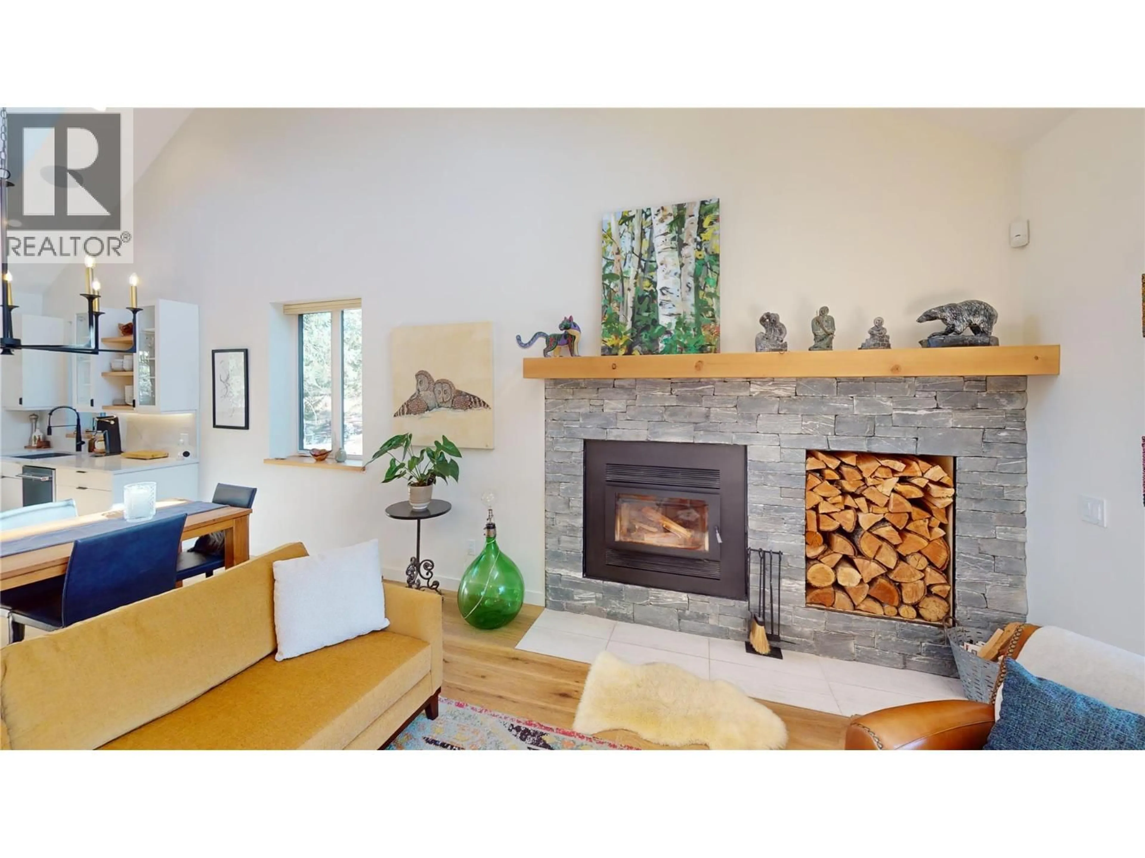 Living room with furniture, wood/laminate floor for 4881 PEDLEY HEIGHTS COURT, Windermere British Columbia V0B2L1