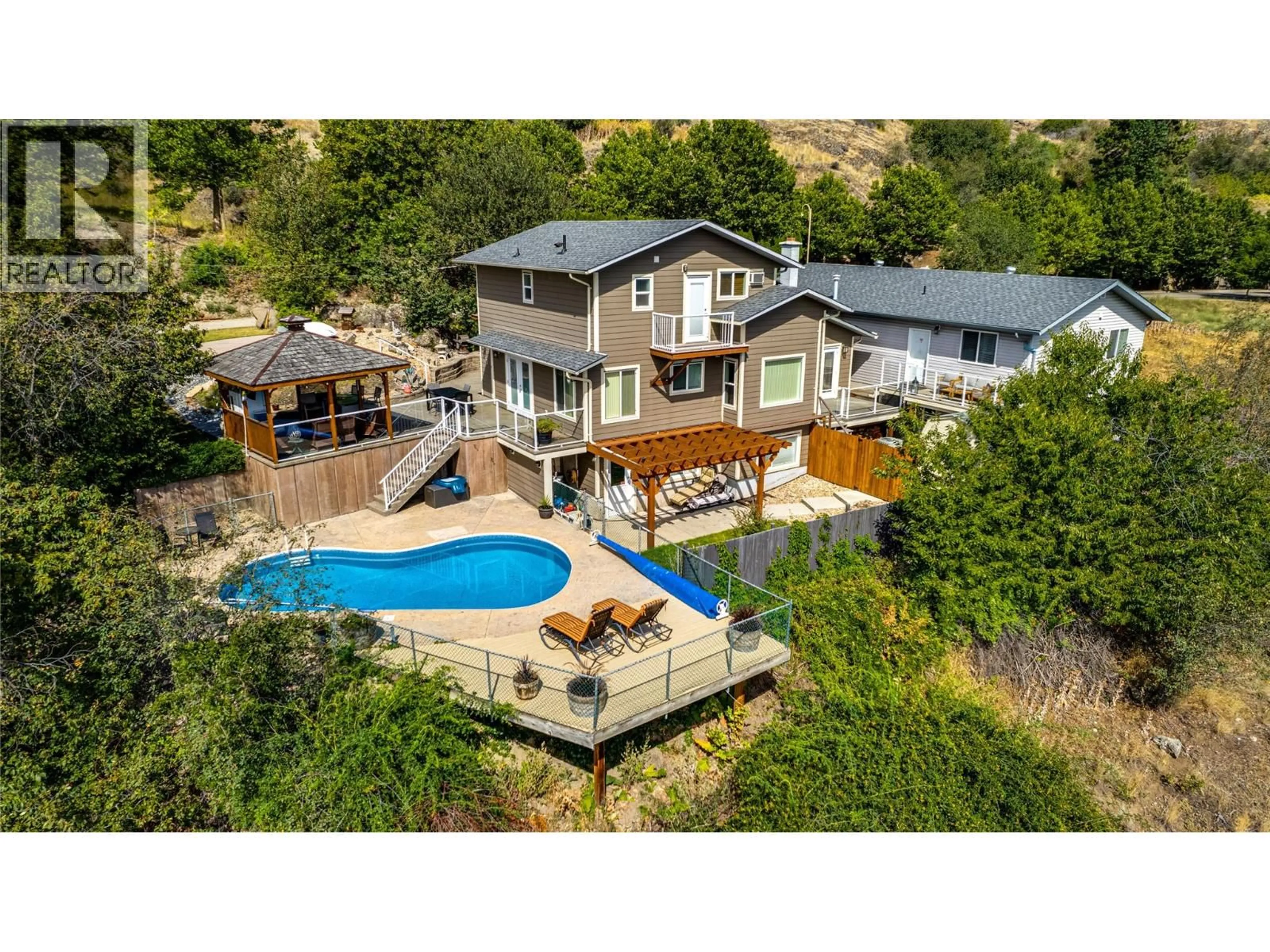 A pic from outside/outdoor area/front of a property/back of a property/a pic from drone, water/lake/river/ocean view for 3951 35 AVENUE, Vernon British Columbia V1T2V1