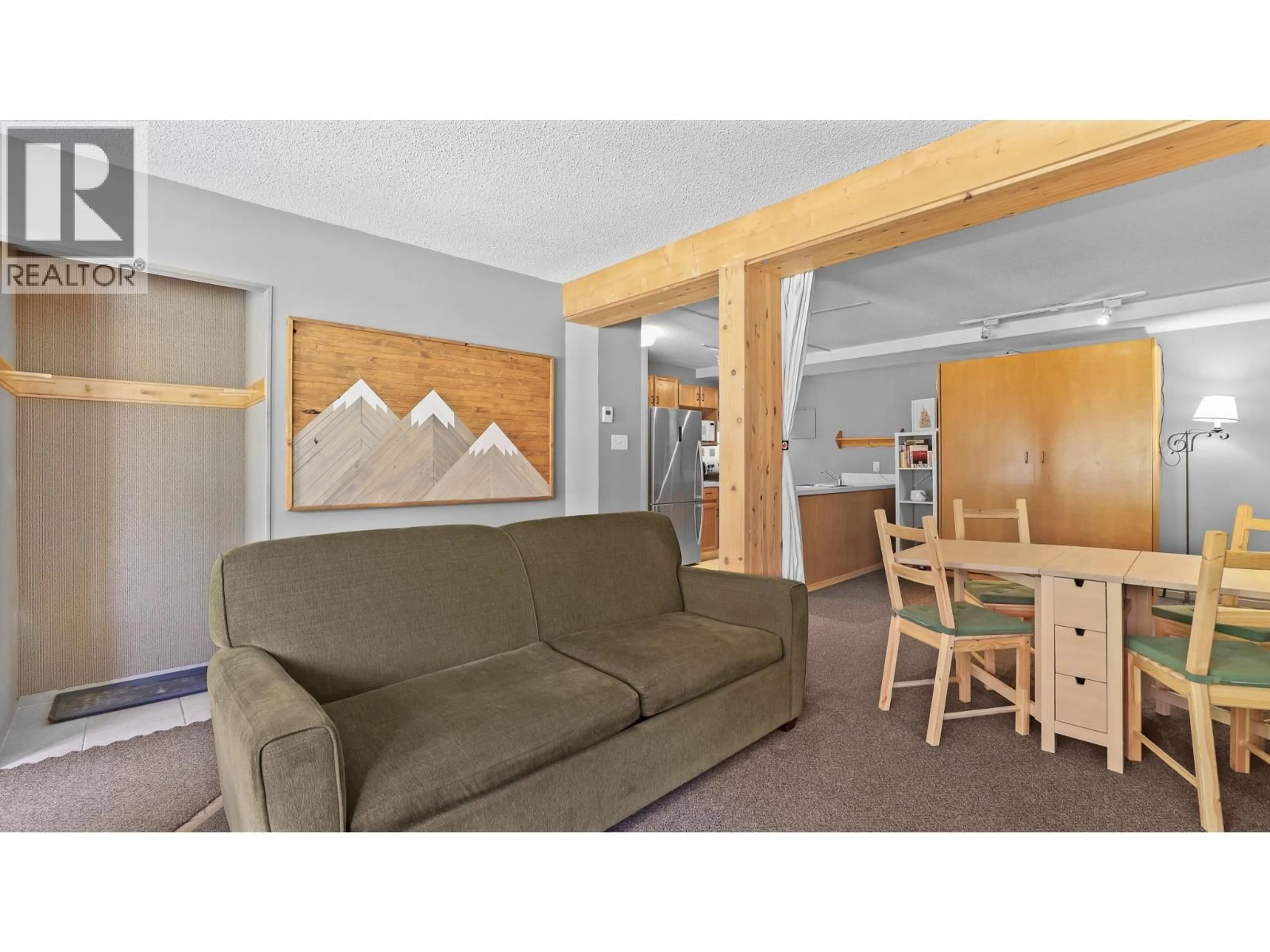 Living room with furniture, wood/laminate floor for 619 - 2030 PANORAMA DRIVE, Panorama British Columbia V0A1T0