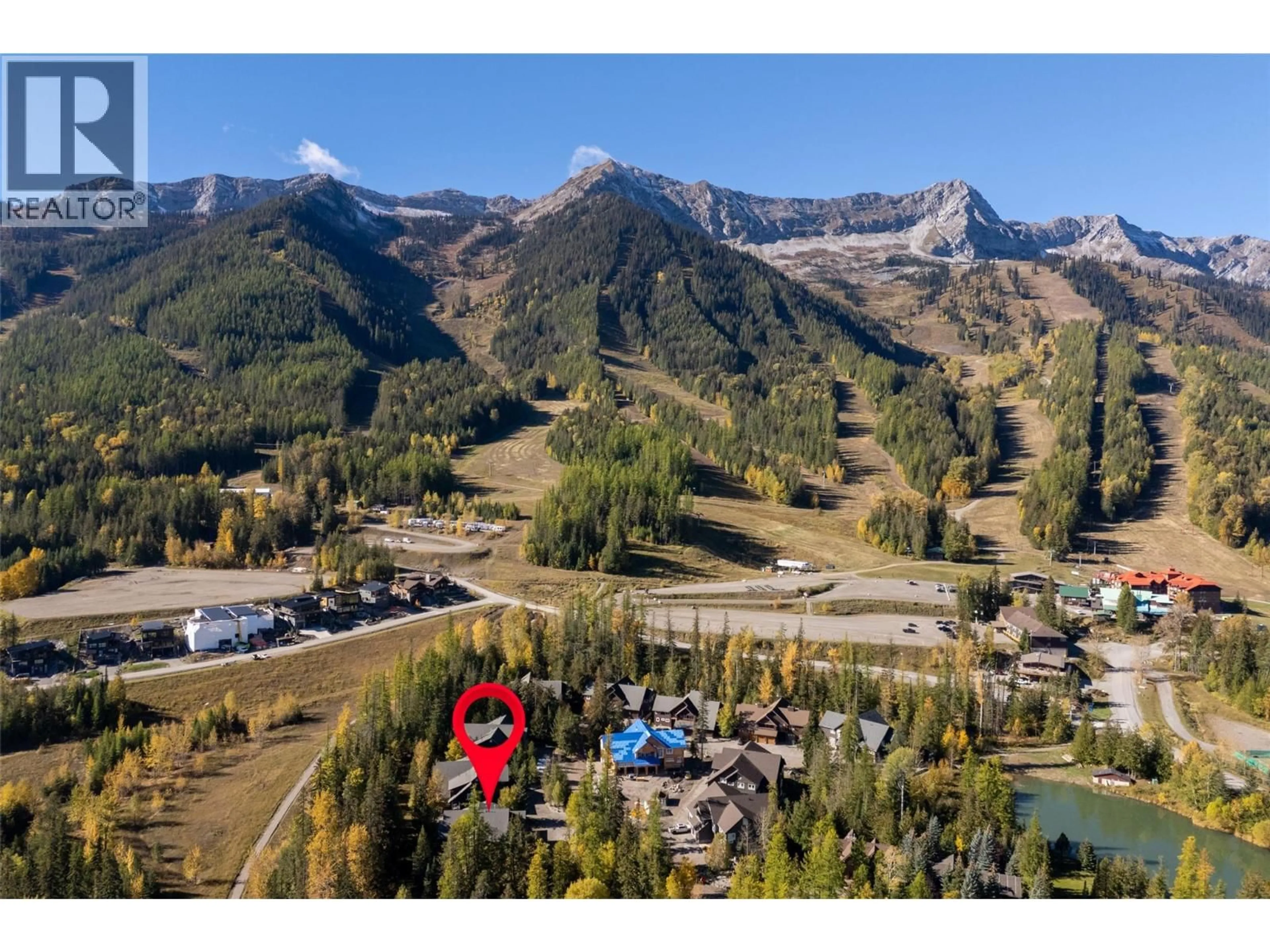 A pic from outside/outdoor area/front of a property/back of a property/a pic from drone, mountain view for 4 - 4576 TIMBERLINE CRESCENT, Fernie British Columbia V0B1M6