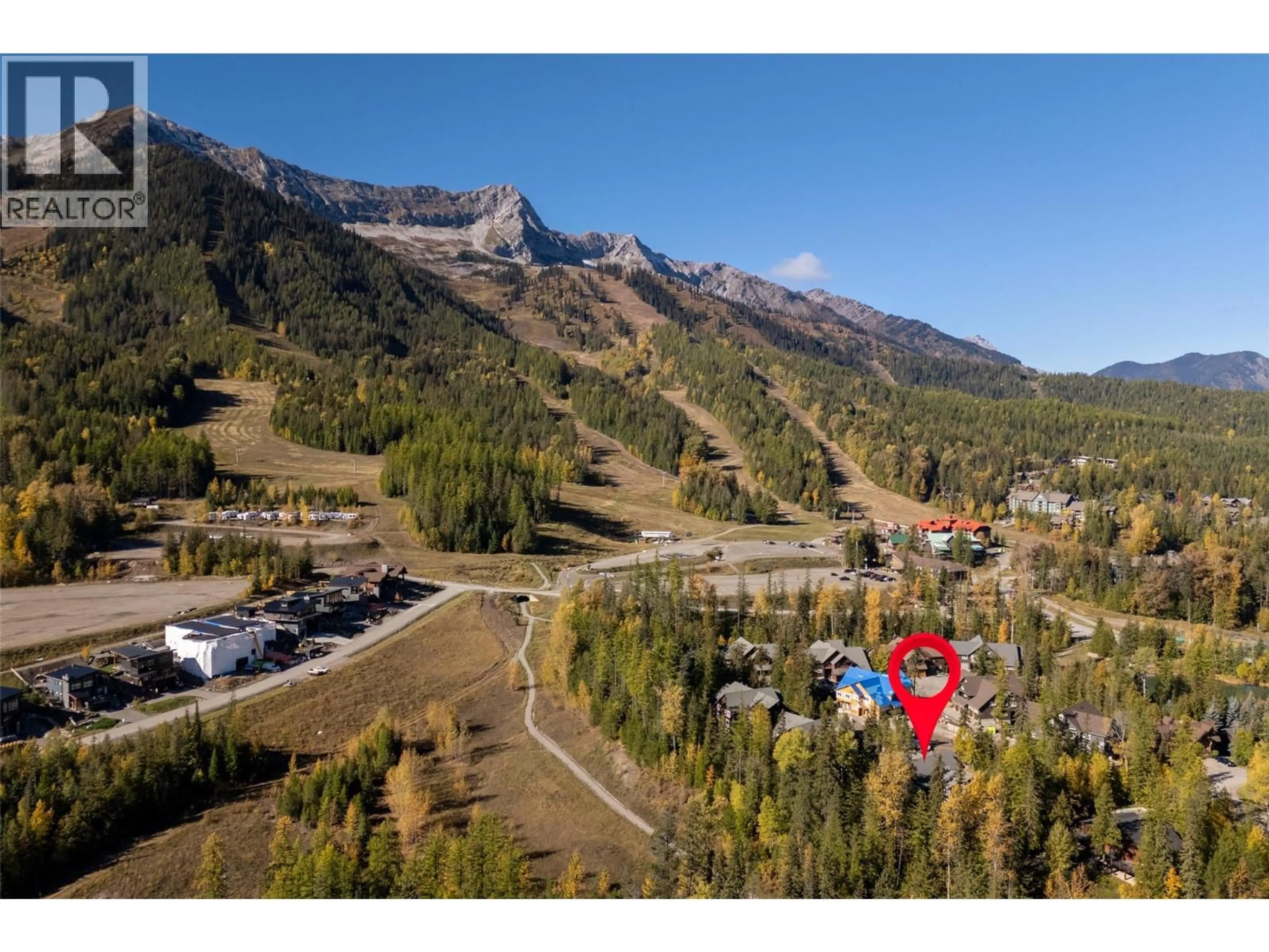 A pic from outside/outdoor area/front of a property/back of a property/a pic from drone, mountain view for 4 - 4576 TIMBERLINE CRESCENT, Fernie British Columbia V0B1M6