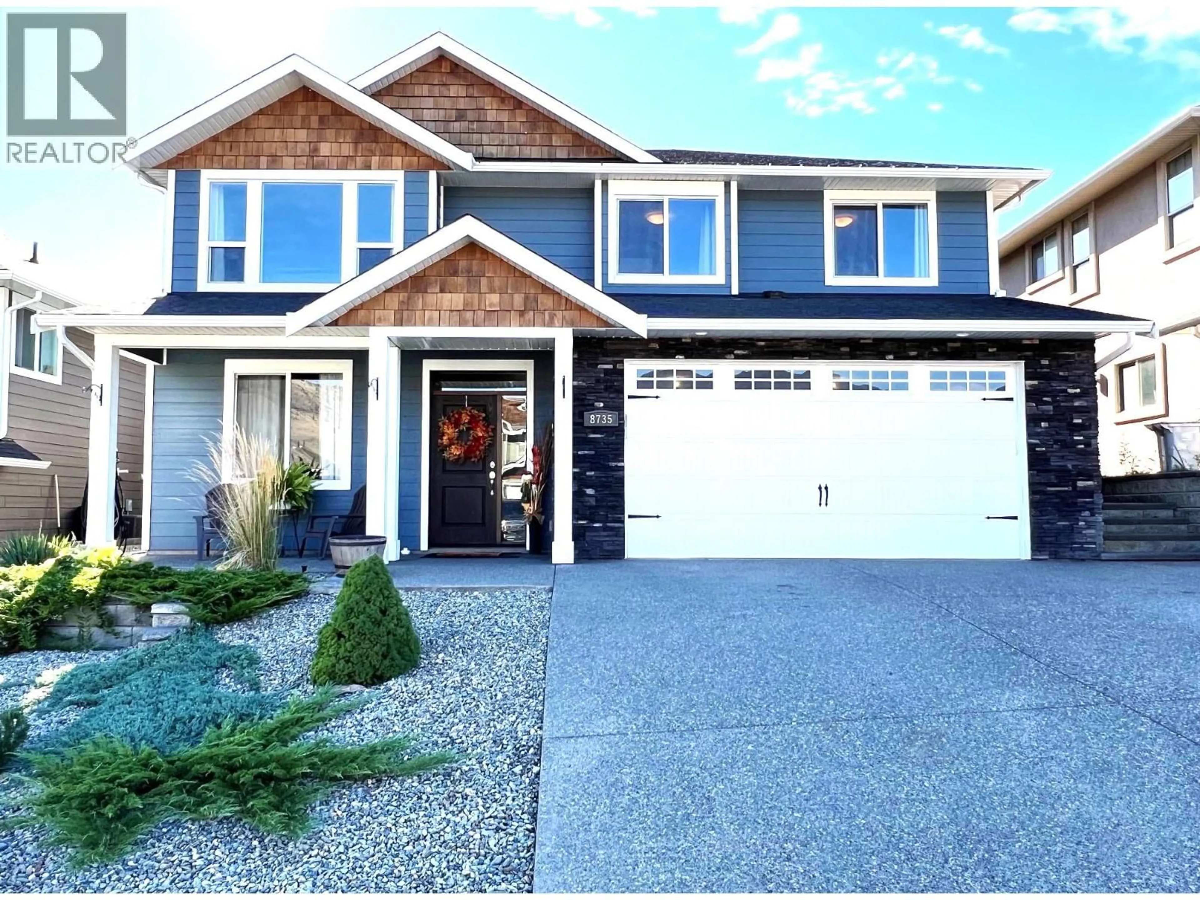Home with vinyl exterior material, street for 8735 BADGER DRIVE, Kamloops British Columbia V2C0B2