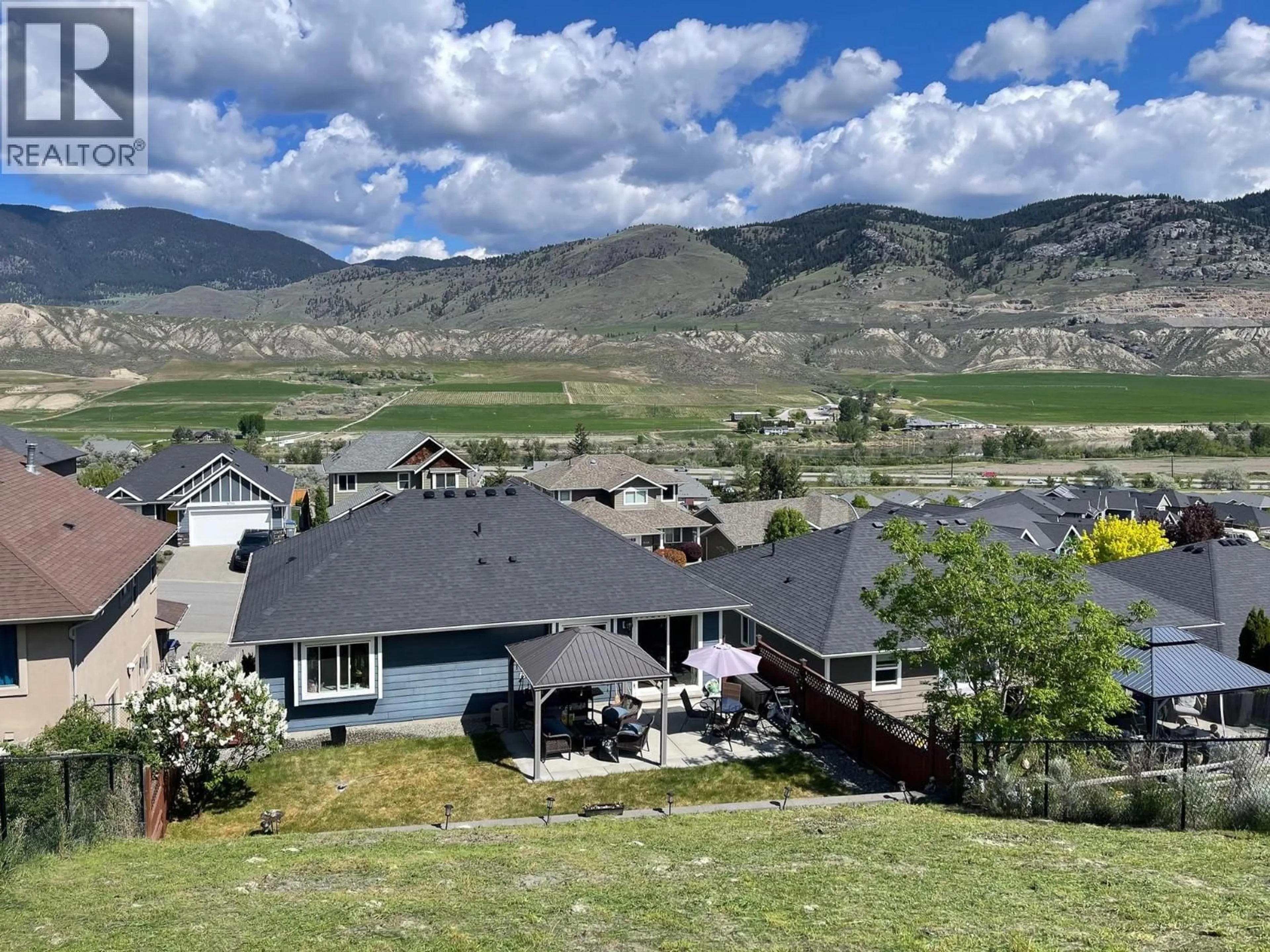 A pic from outside/outdoor area/front of a property/back of a property/a pic from drone, mountain view for 8735 BADGER DRIVE, Kamloops British Columbia V2C0B2
