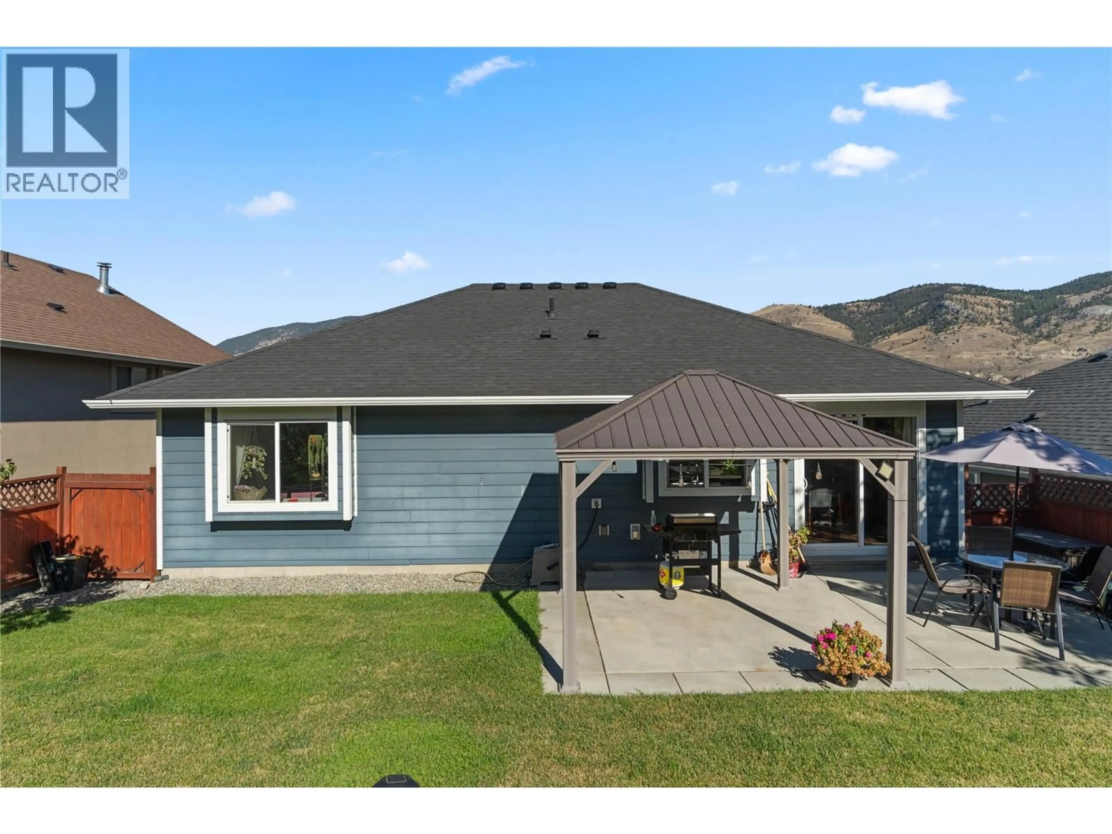 Home with vinyl exterior material, mountain view for 8735 BADGER DRIVE, Kamloops British Columbia V2C0B2