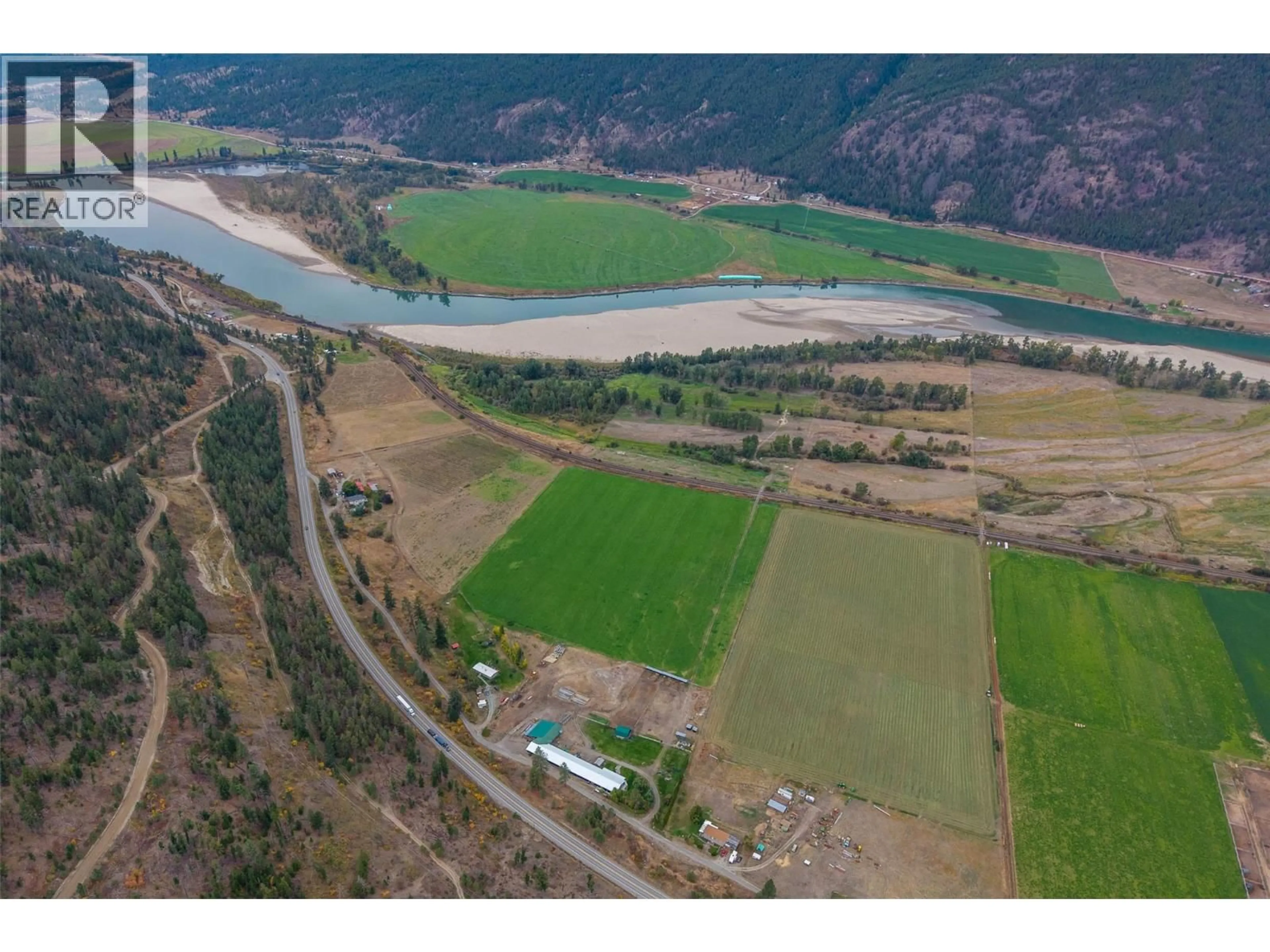 A pic from outside/outdoor area/front of a property/back of a property/a pic from drone, water/lake/river/ocean view for 8245 EDWARDS ROAD, Kamloops British Columbia V0E1Z2