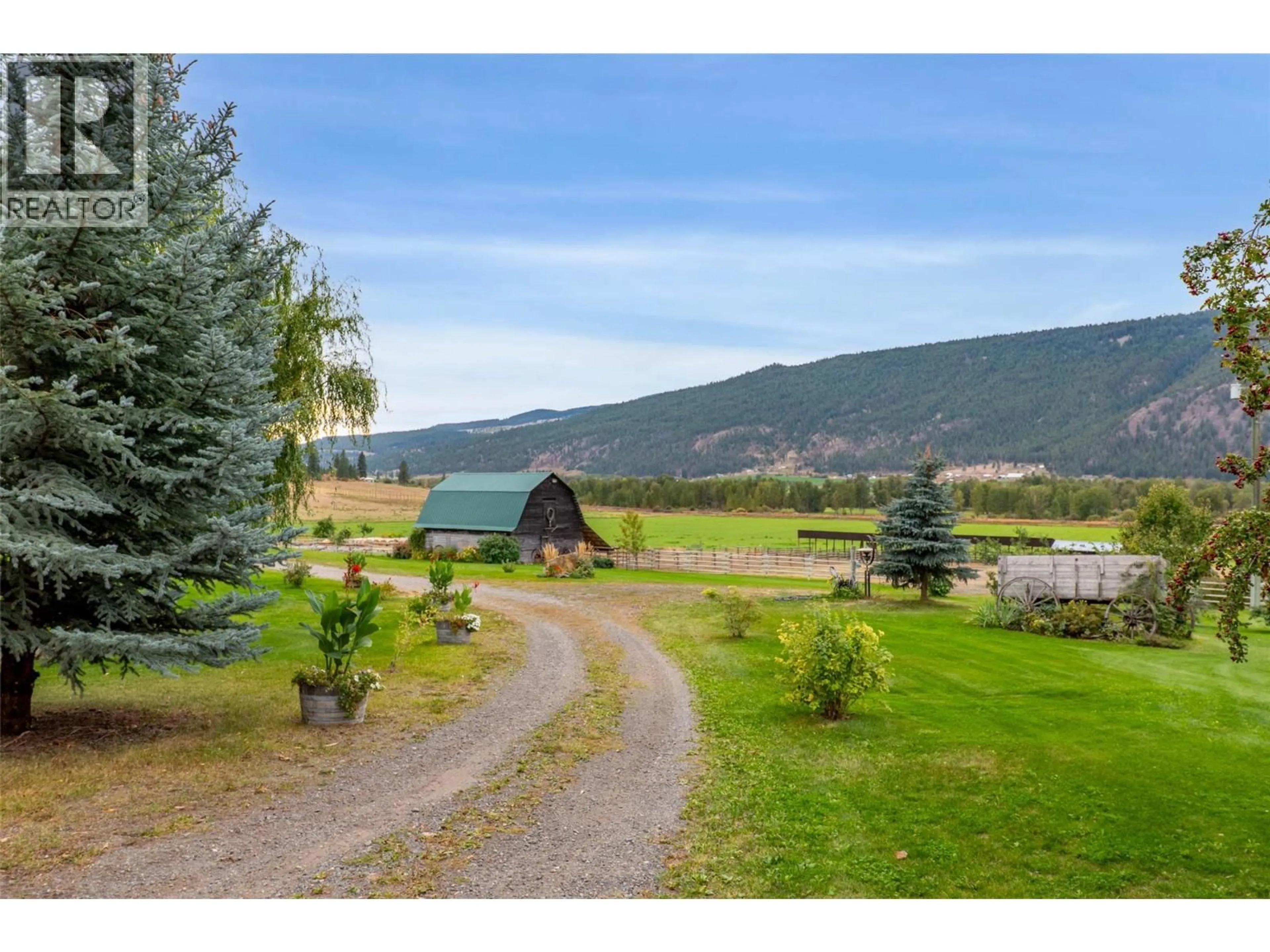 A pic from outside/outdoor area/front of a property/back of a property/a pic from drone, mountain view for 8245 EDWARDS ROAD, Kamloops British Columbia V0E1Z2