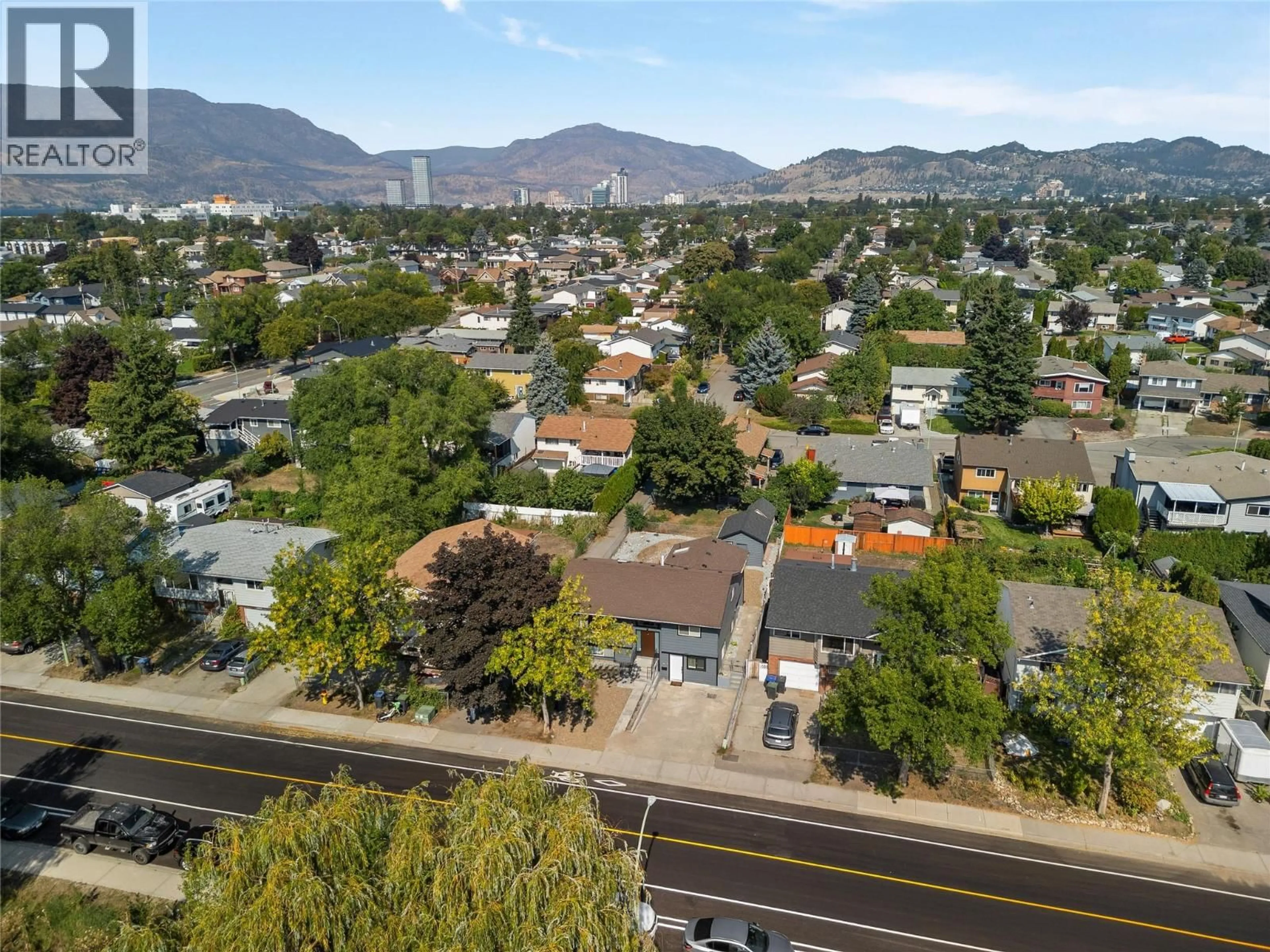 A pic from outside/outdoor area/front of a property/back of a property/a pic from drone, mountain view for 950 RAYMER AVENUE, Kelowna British Columbia V1Y4Z9