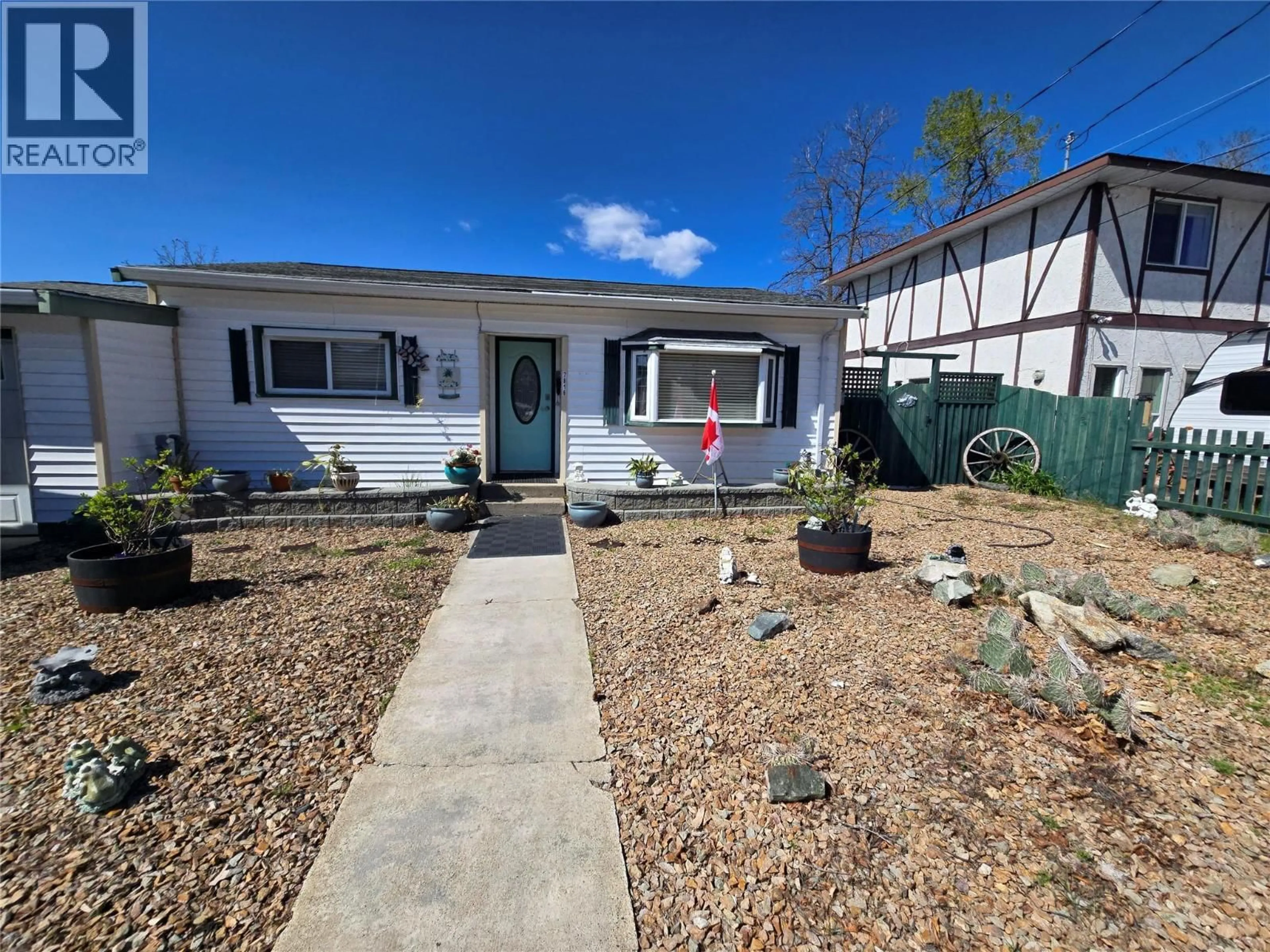A pic from outside/outdoor area/front of a property/back of a property/a pic from drone, street for 7816 89TH STREET, Osoyoos British Columbia V0h1V0