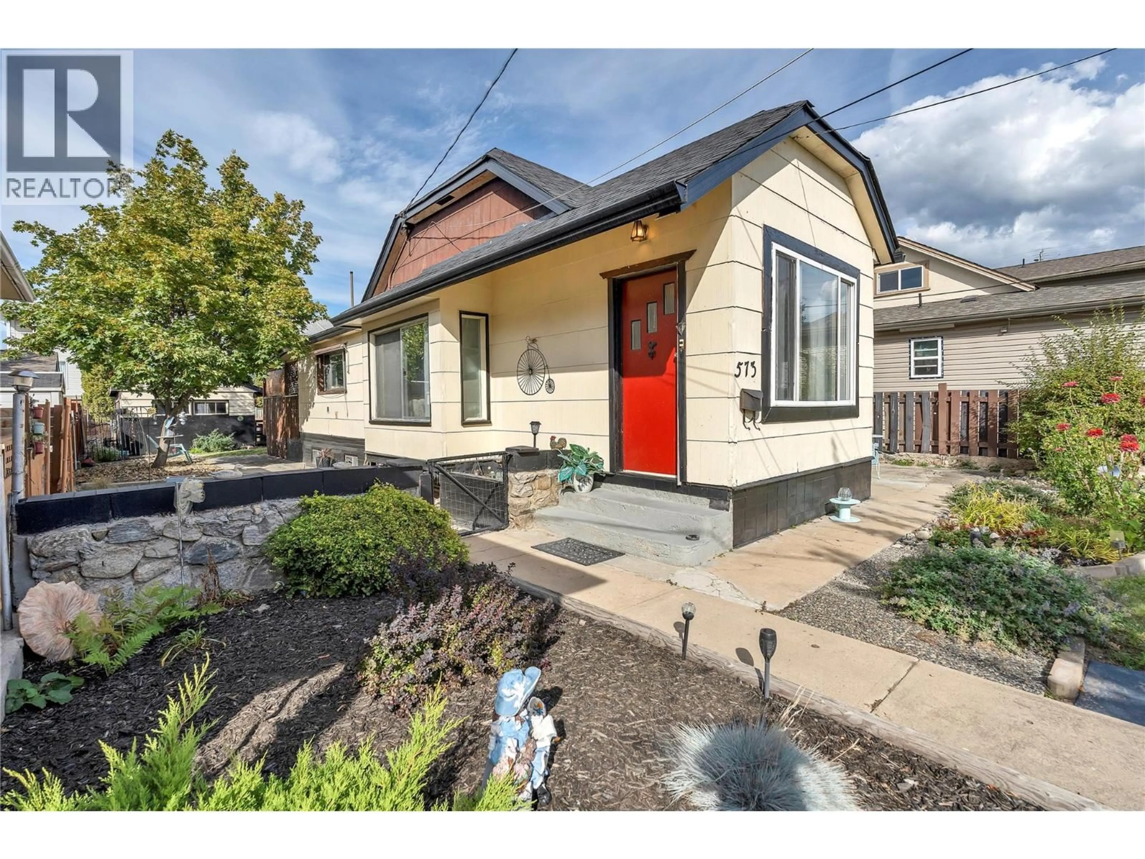 Home with vinyl exterior material, street for 573 JERMYN AVENUE, Penticton British Columbia V2A2E2
