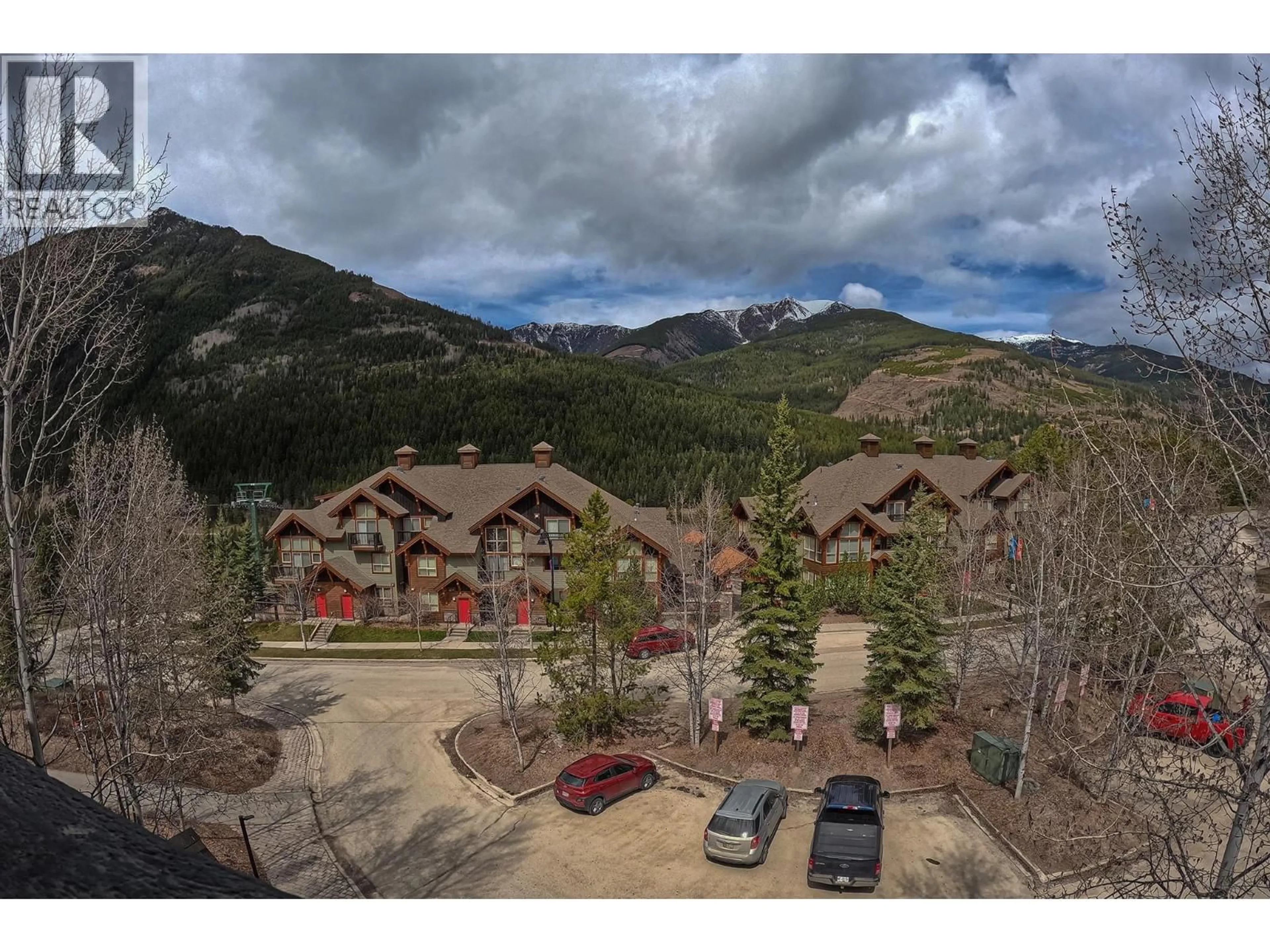 A pic from outside/outdoor area/front of a property/back of a property/a pic from drone, mountain view for 306 - 2050 SUMMIT DRIVE OTHER, Panorama British Columbia V0A1T0
