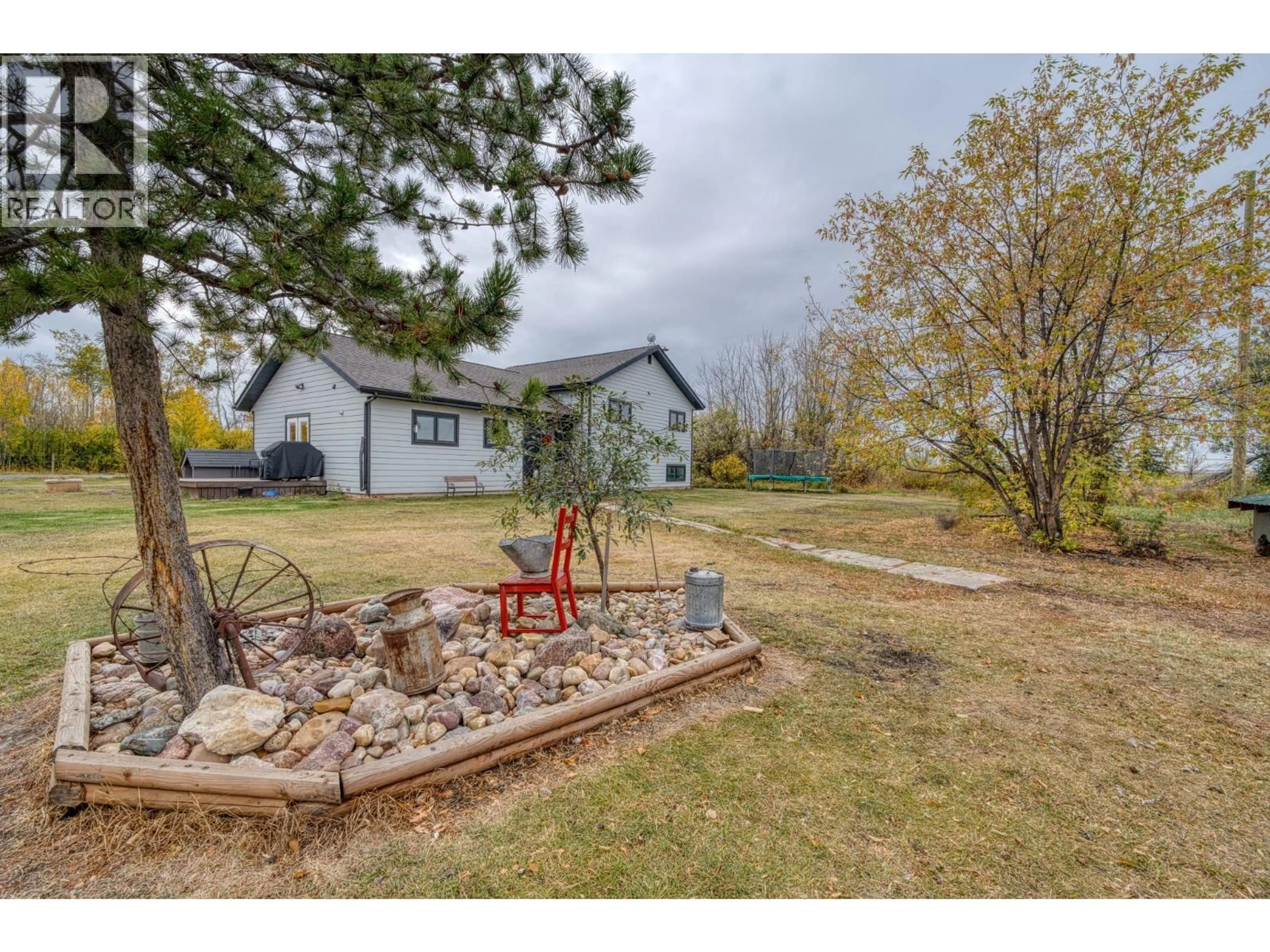 A pic from outside/outdoor area/front of a property/back of a property/a pic from drone, water/lake/river/ocean view for 279 LANDRY ROAD, Dawson Creek British Columbia V1G4E8