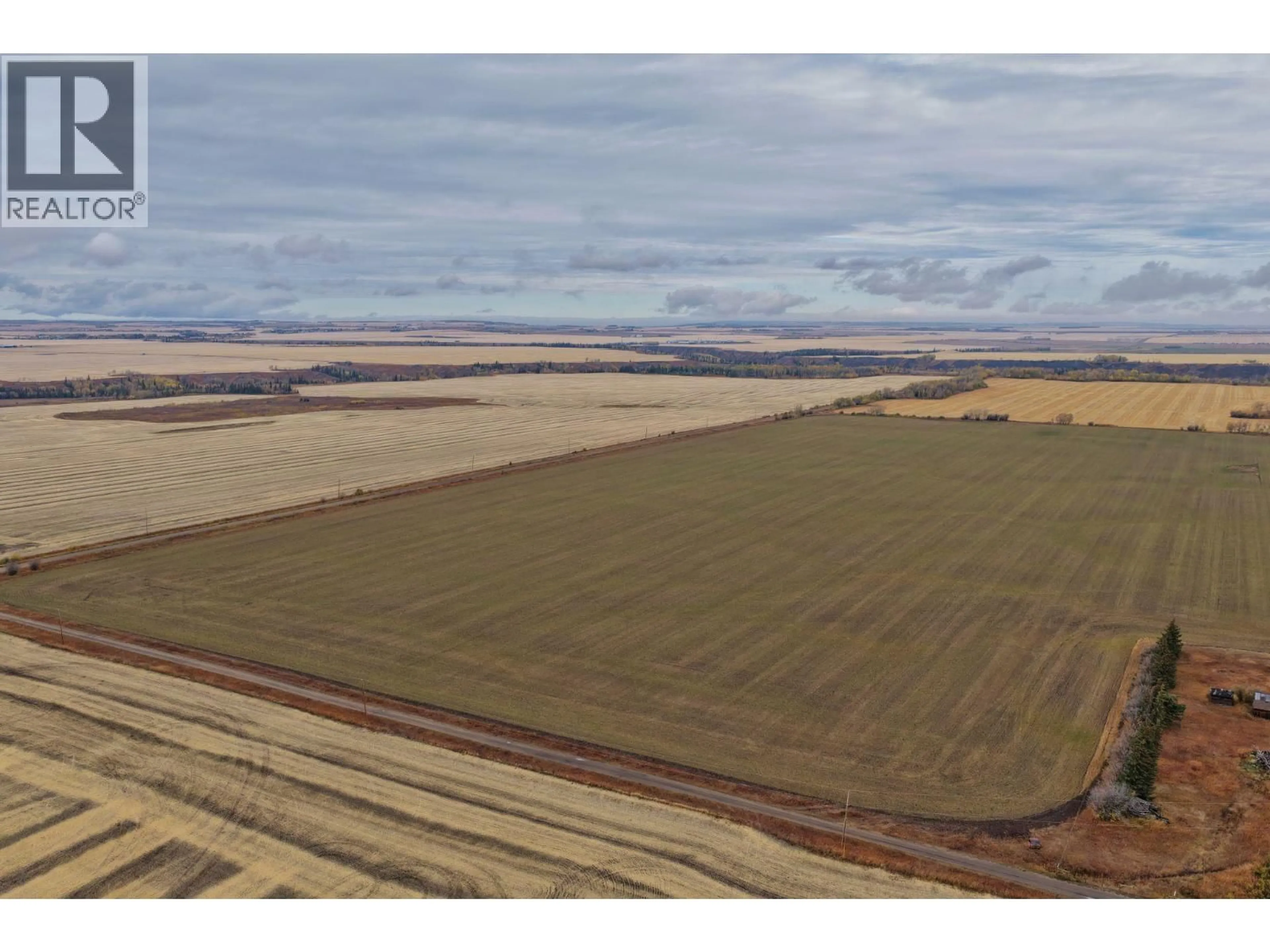 A pic from outside/outdoor area/front of a property/back of a property/a pic from drone, unknown for 279 LANDRY ROAD, Dawson Creek British Columbia V1G4E8