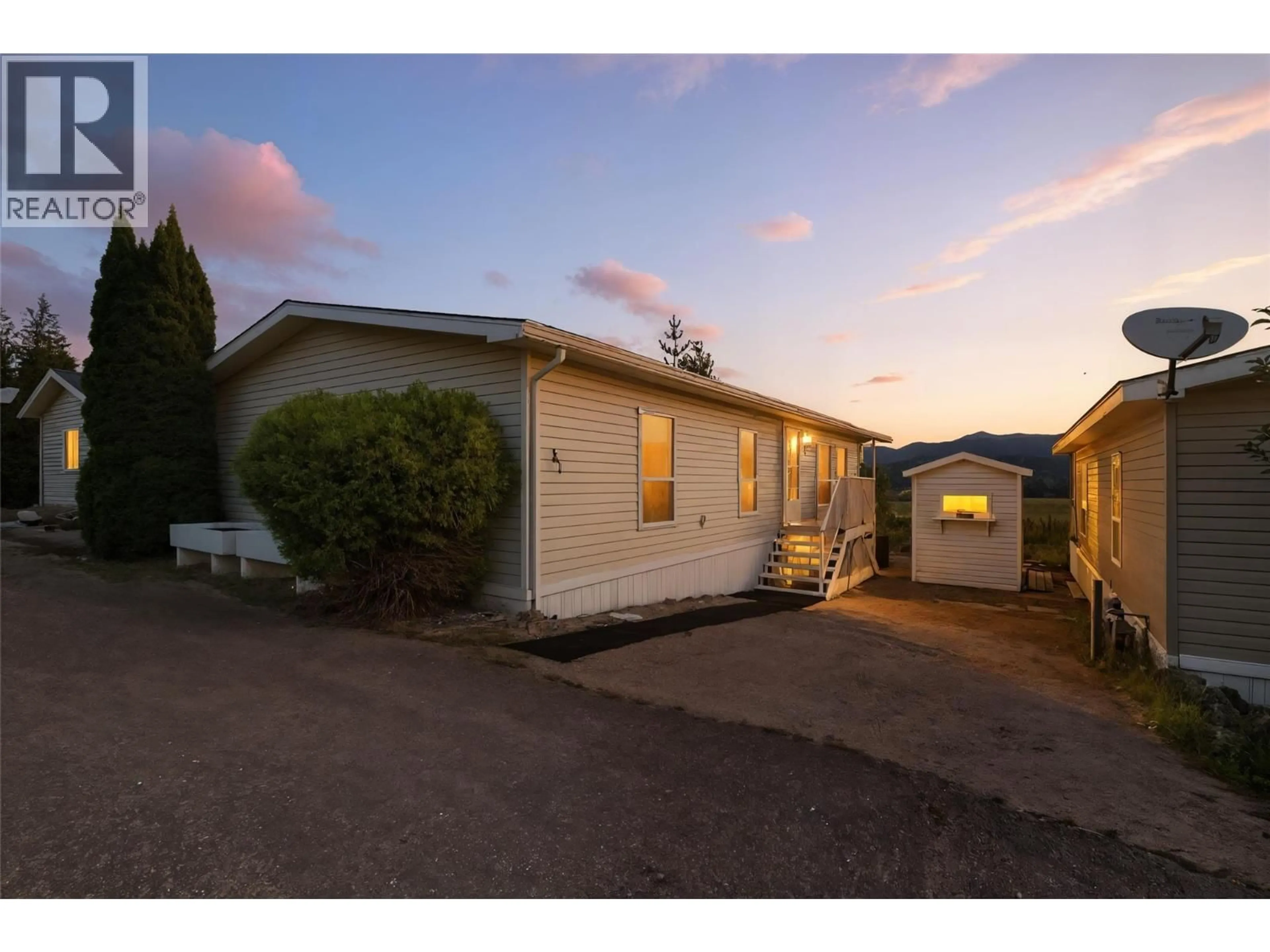 A pic from outside/outdoor area/front of a property/back of a property/a pic from drone, street for 32 - 1885 TAPPEN NOTCH HILL ROAD, Tappen British Columbia V0E2X3