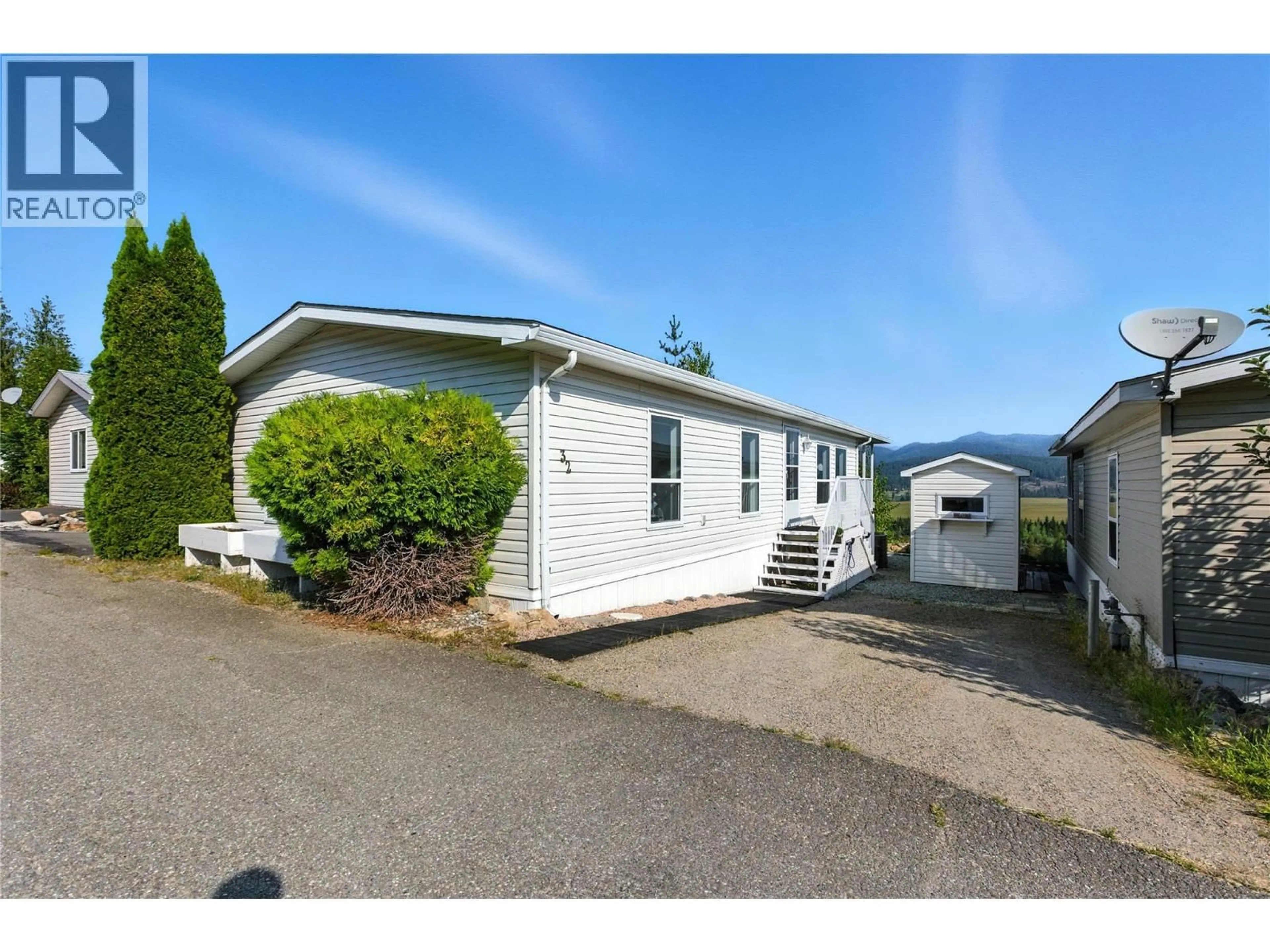 Home with vinyl exterior material, street for 32 - 1885 TAPPEN NOTCH HILL ROAD, Tappen British Columbia V0E2X3