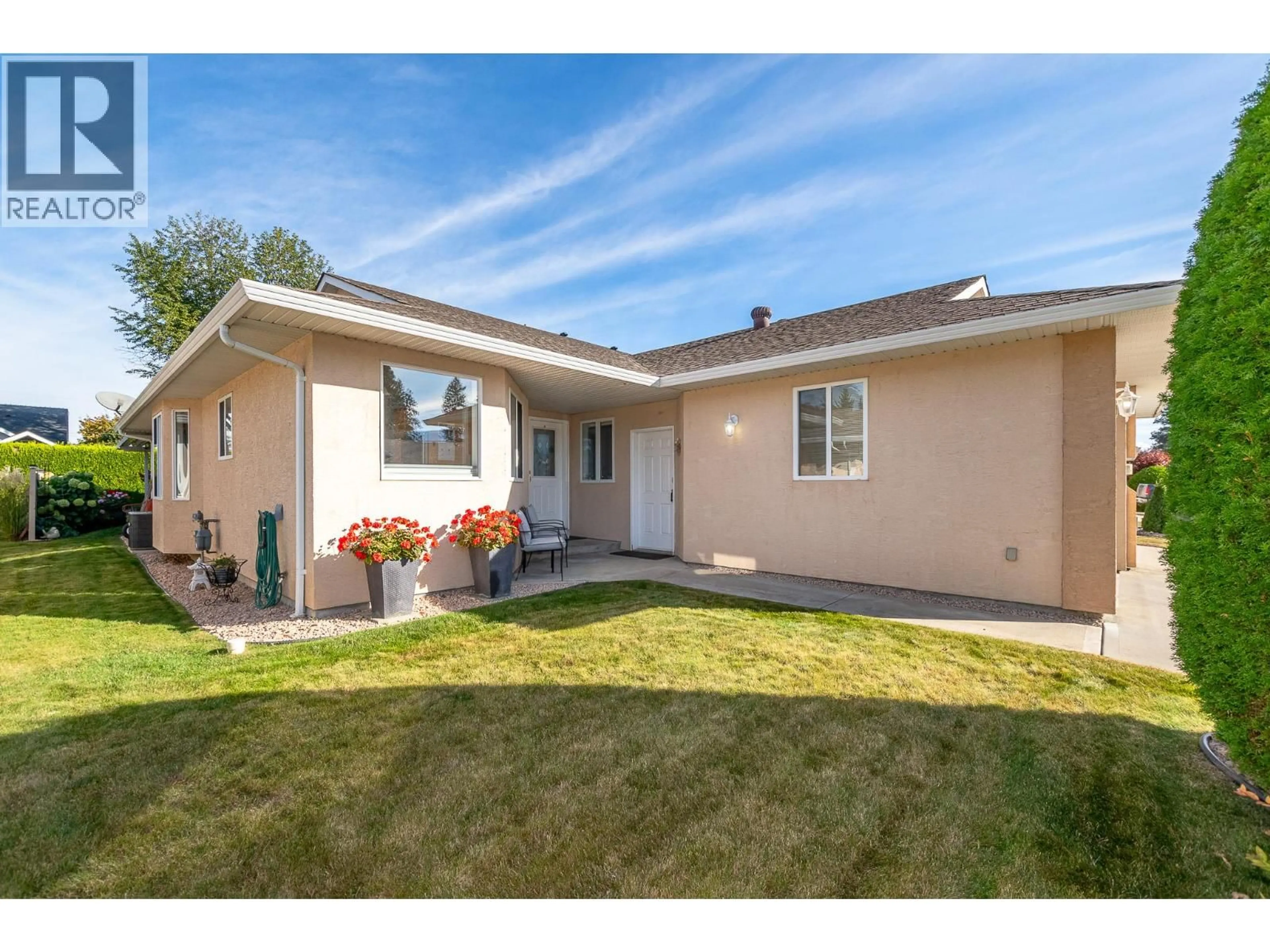 Home with vinyl exterior material, street for 18 - 201 KILDONAN AVENUE, Enderby British Columbia V4Y4M8