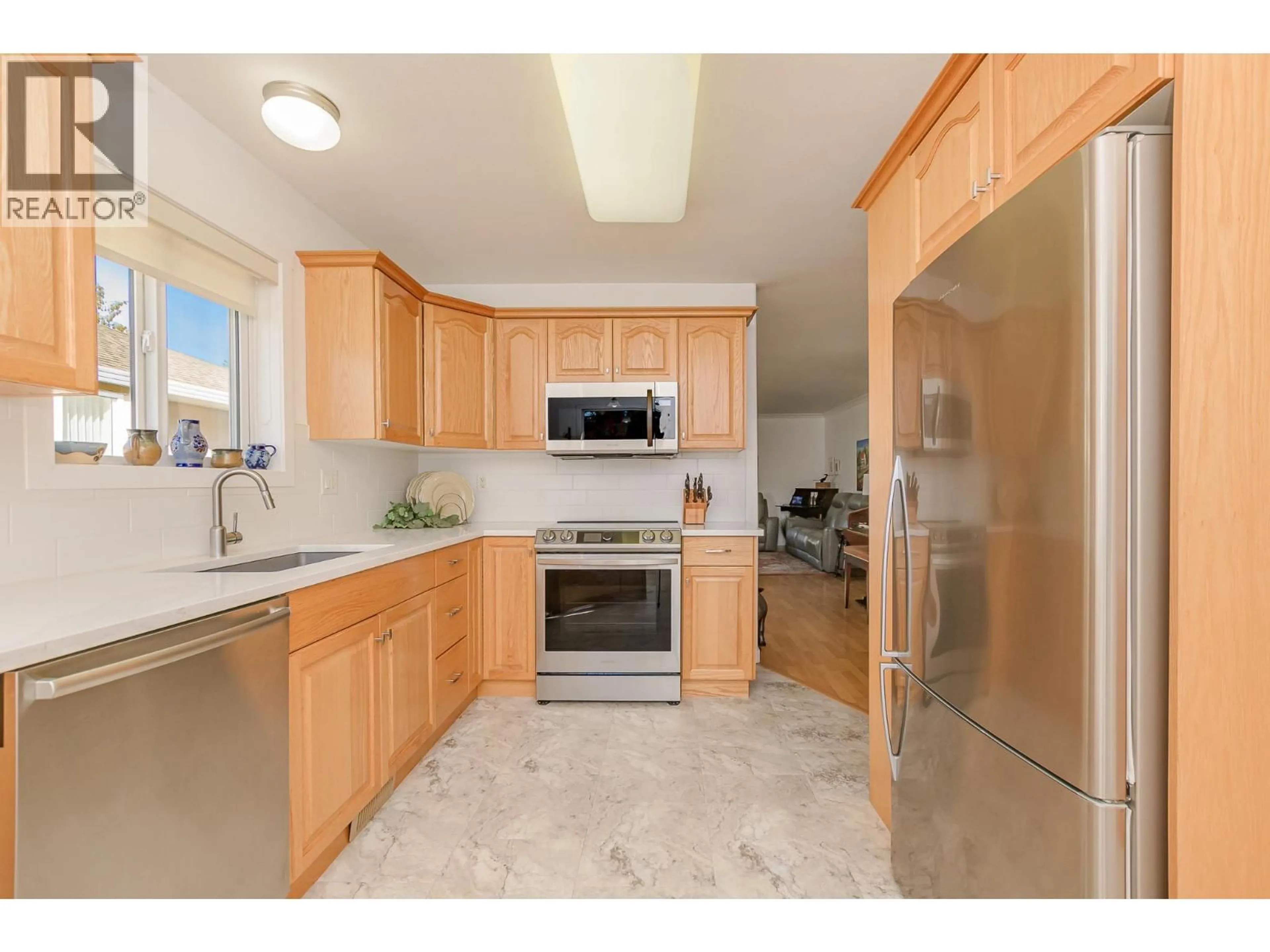 Standard kitchen, ceramic/tile floor for 18 - 201 KILDONAN AVENUE, Enderby British Columbia V4Y4M8