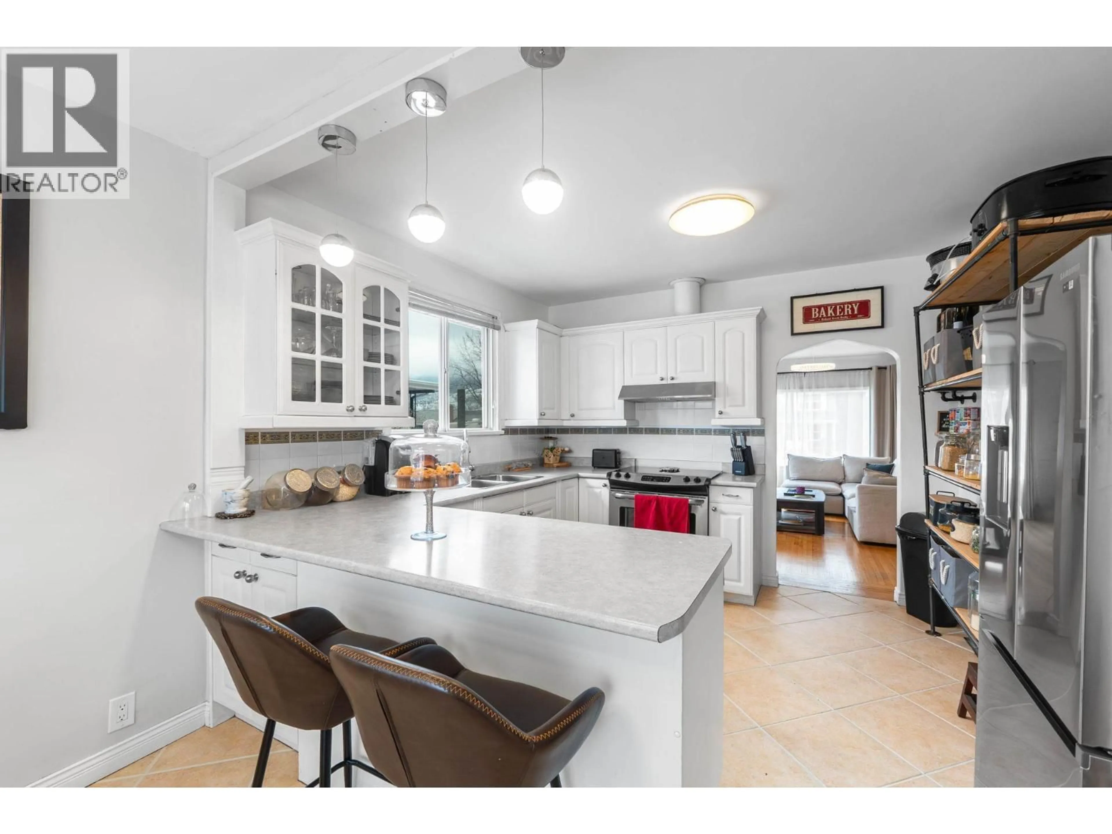 Open concept kitchen, ceramic/tile floor for 634 LATIMER AVENUE, Penticton British Columbia V2A5R6