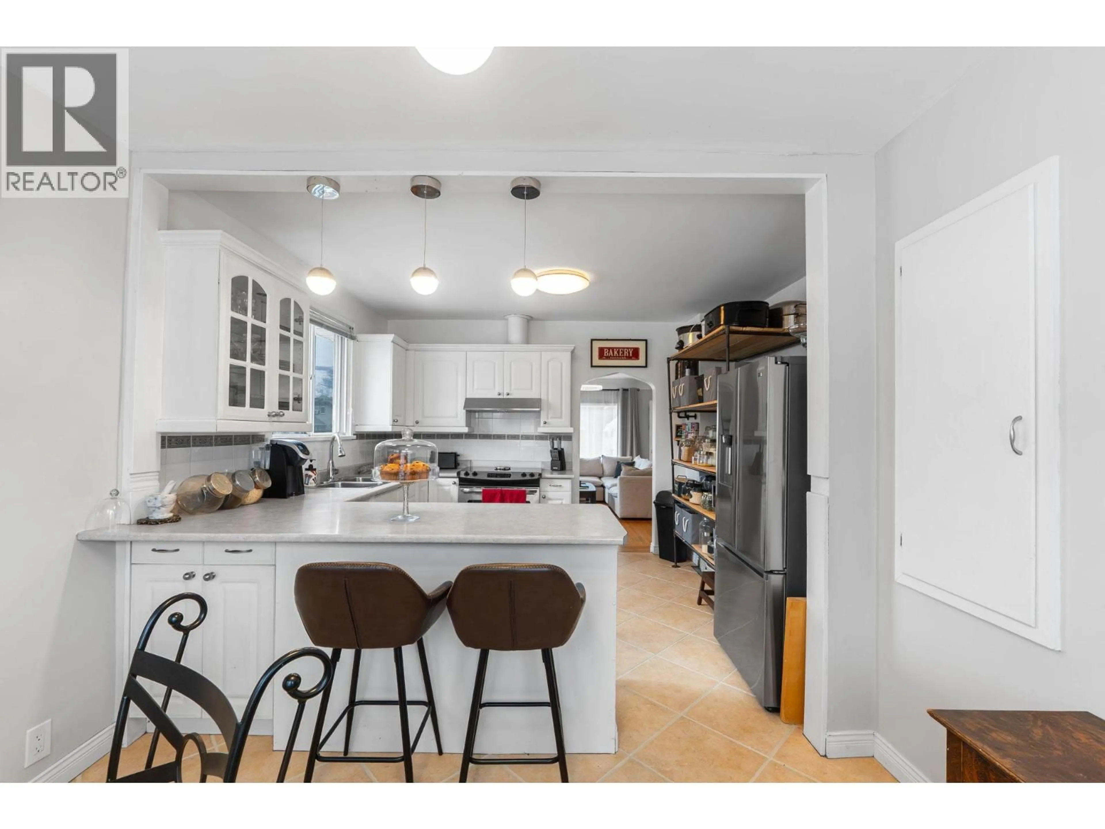 Open concept kitchen, ceramic/tile floor for 634 LATIMER AVENUE, Penticton British Columbia V2A5R6