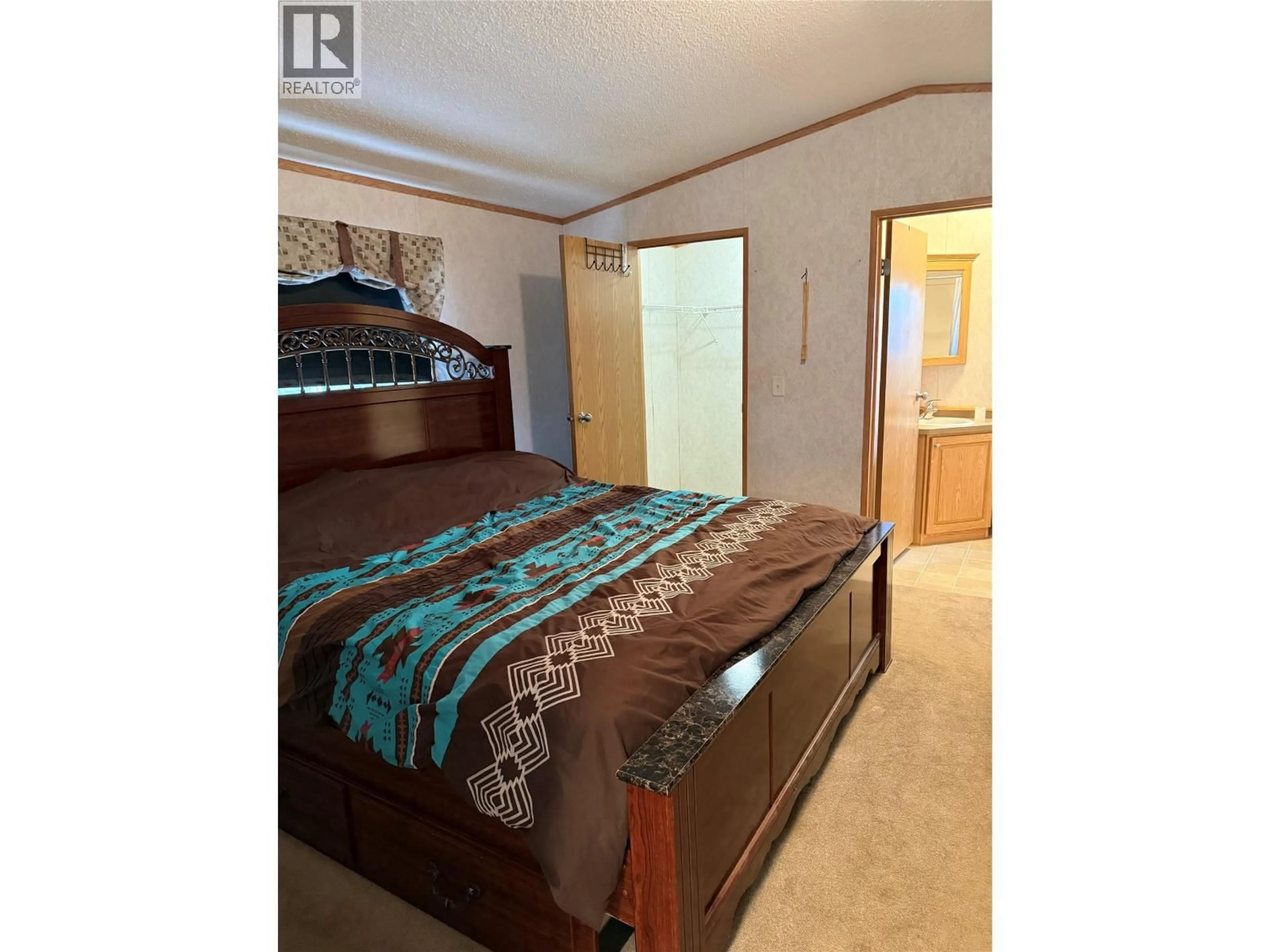 Bedroom with bed, unknown for 155 PINEWOOD CRESCENT, Tumbler Ridge British Columbia V0C2W0