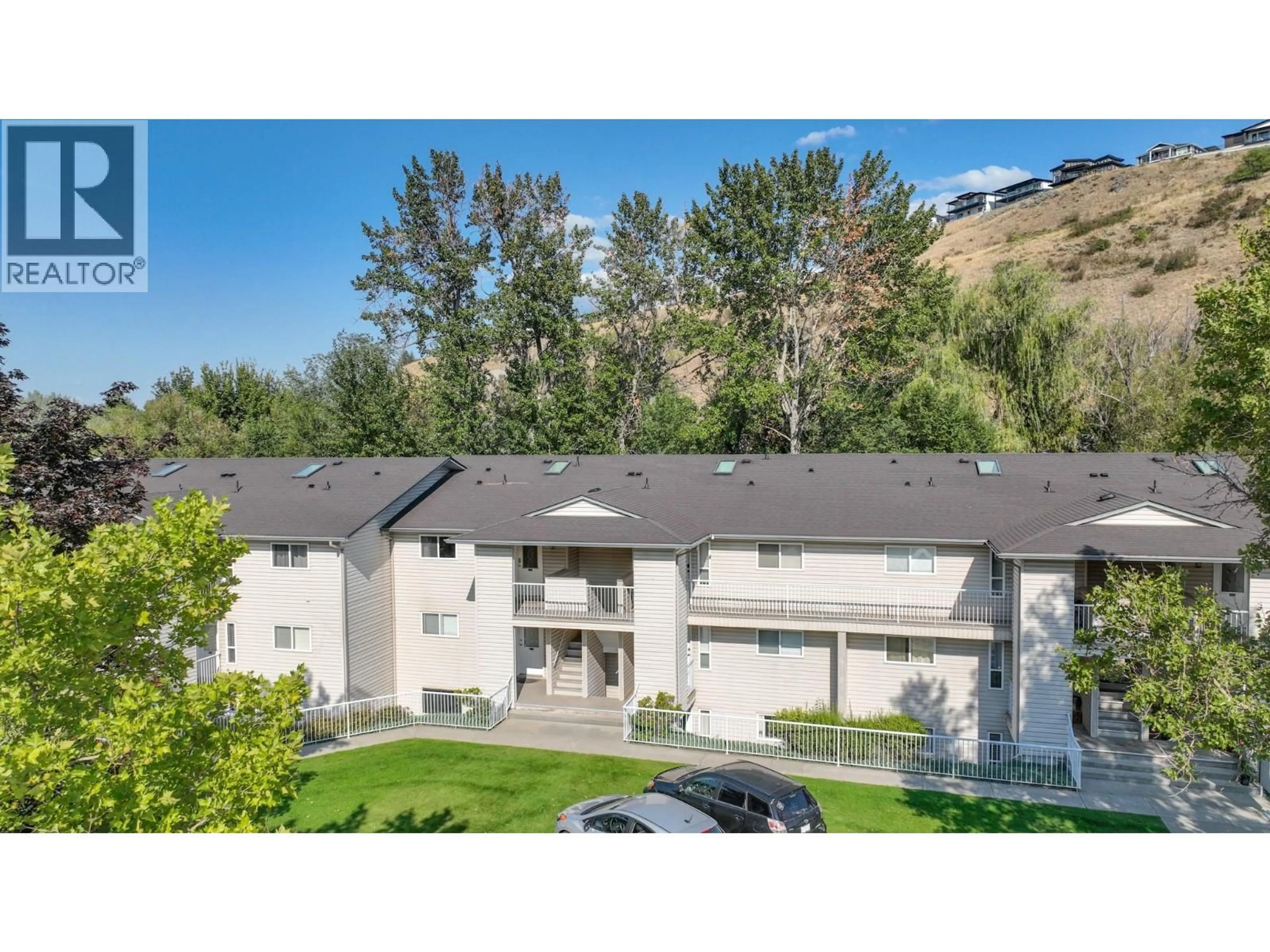 A pic from outside/outdoor area/front of a property/back of a property/a pic from drone, mountain view for 107 - 110 KALAMALKA LAKE ROAD, Vernon British Columbia V1T7M3