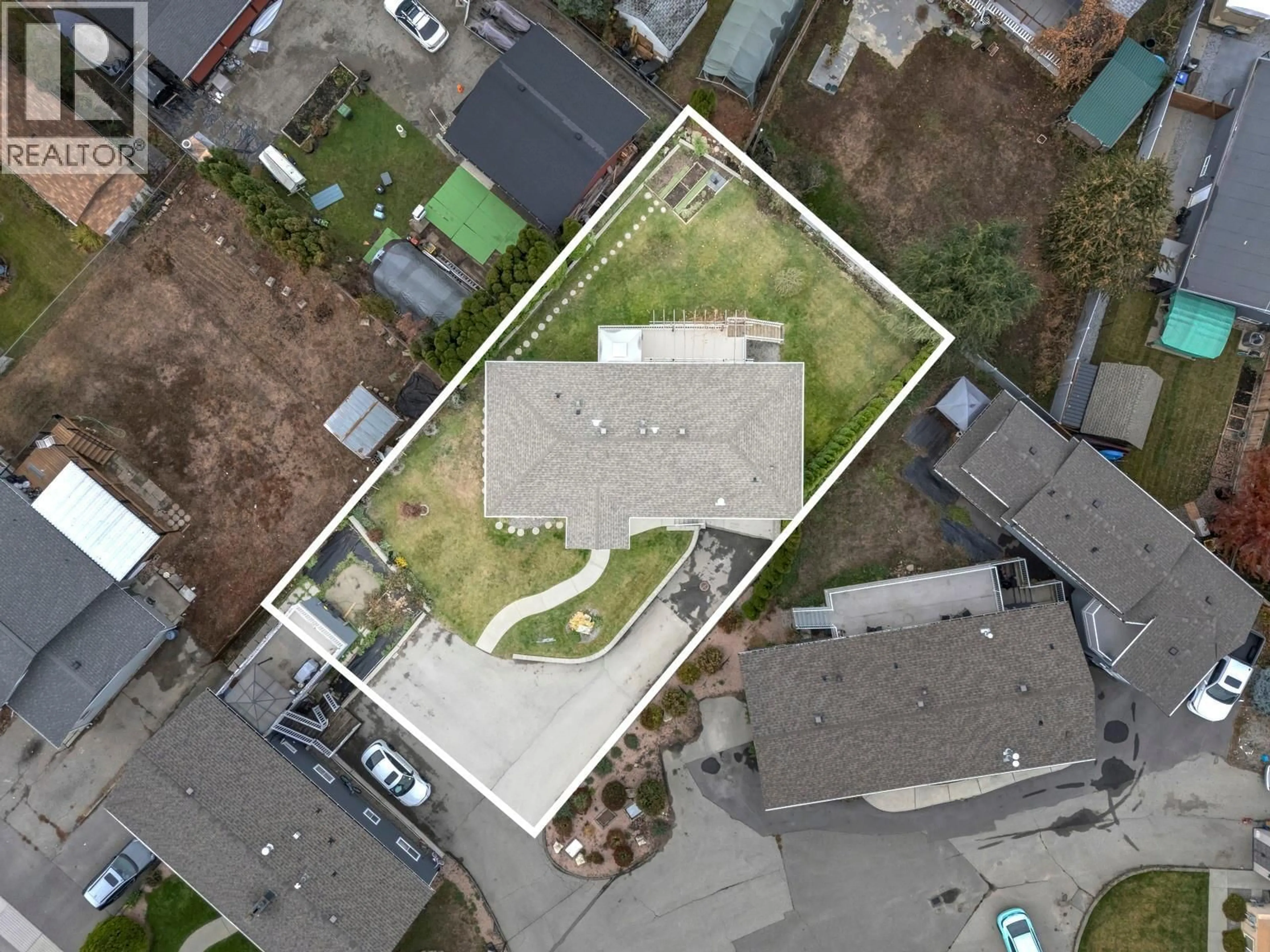 A pic from outside/outdoor area/front of a property/back of a property/a pic from drone, street for 202 PEARSON ROAD, Kelowna British Columbia V1X7T6
