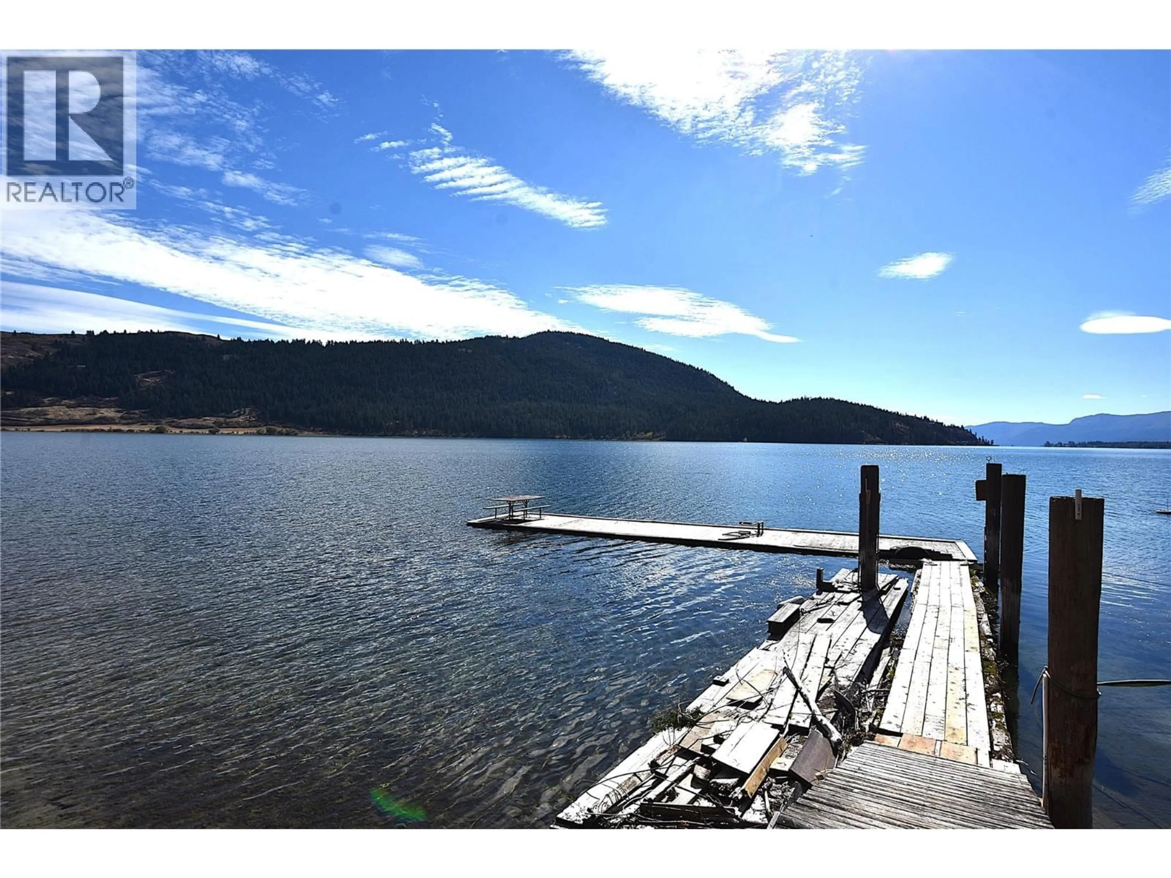 A pic from outside/outdoor area/front of a property/back of a property/a pic from drone, water/lake/river/ocean view for 3 MARY ANNE'S ROAD, Vernon British Columbia V1H2C8