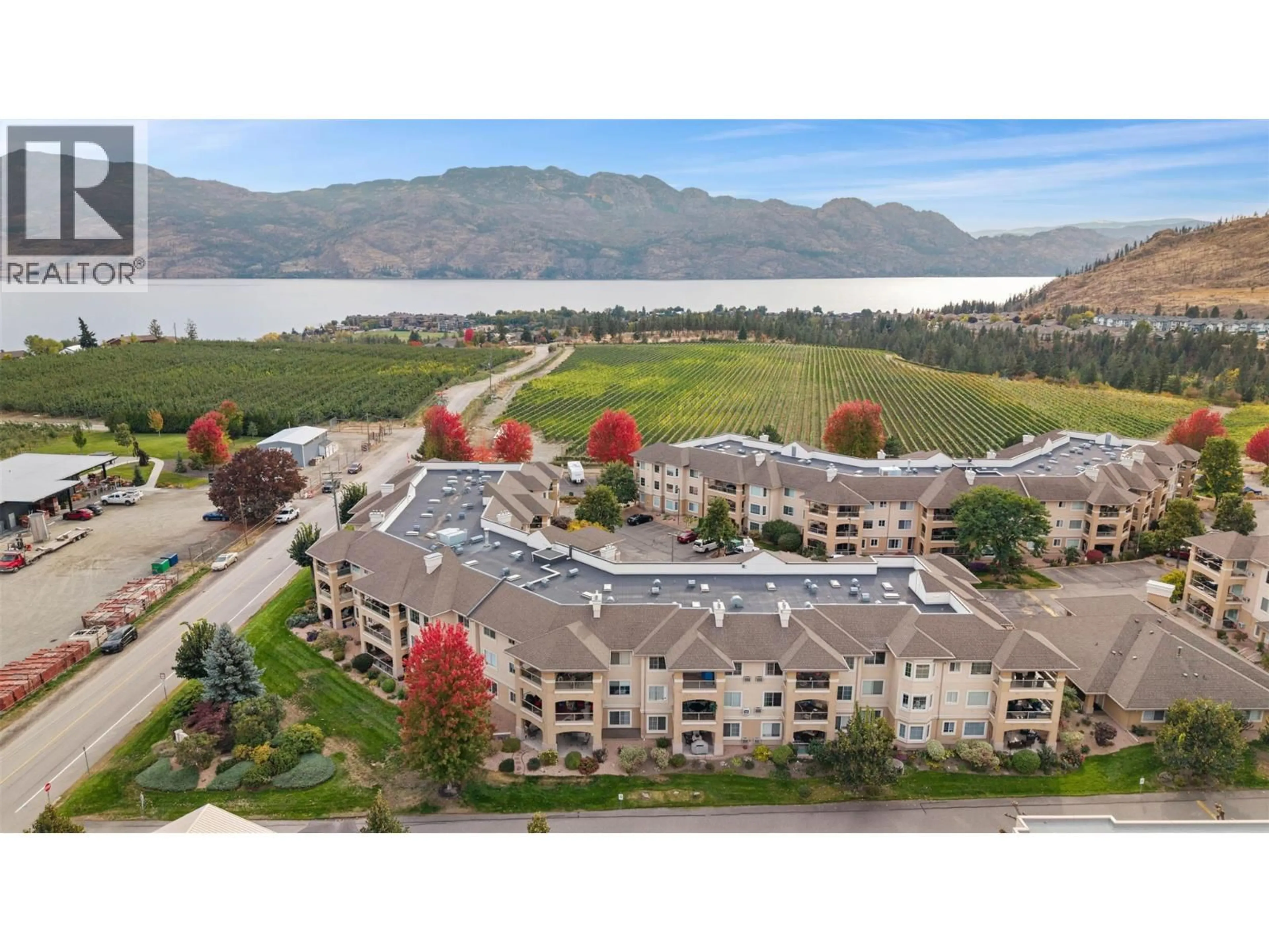 A pic from outside/outdoor area/front of a property/back of a property/a pic from drone, water/lake/river/ocean view for 305 - 3870 BROWN ROAD, West Kelowna British Columbia V4T2J5