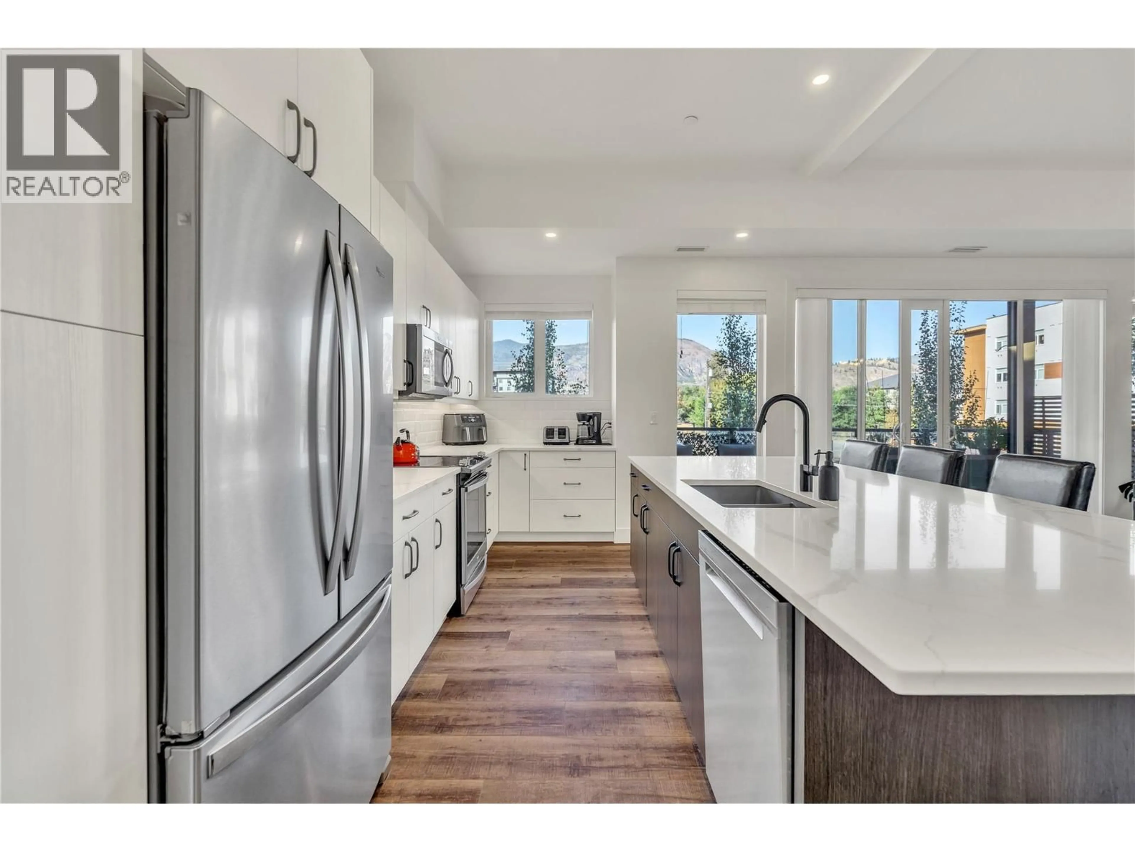 Open concept kitchen, ceramic/tile floor for 214 - 3313 WILSON STREET, Penticton British Columbia V2A8J3