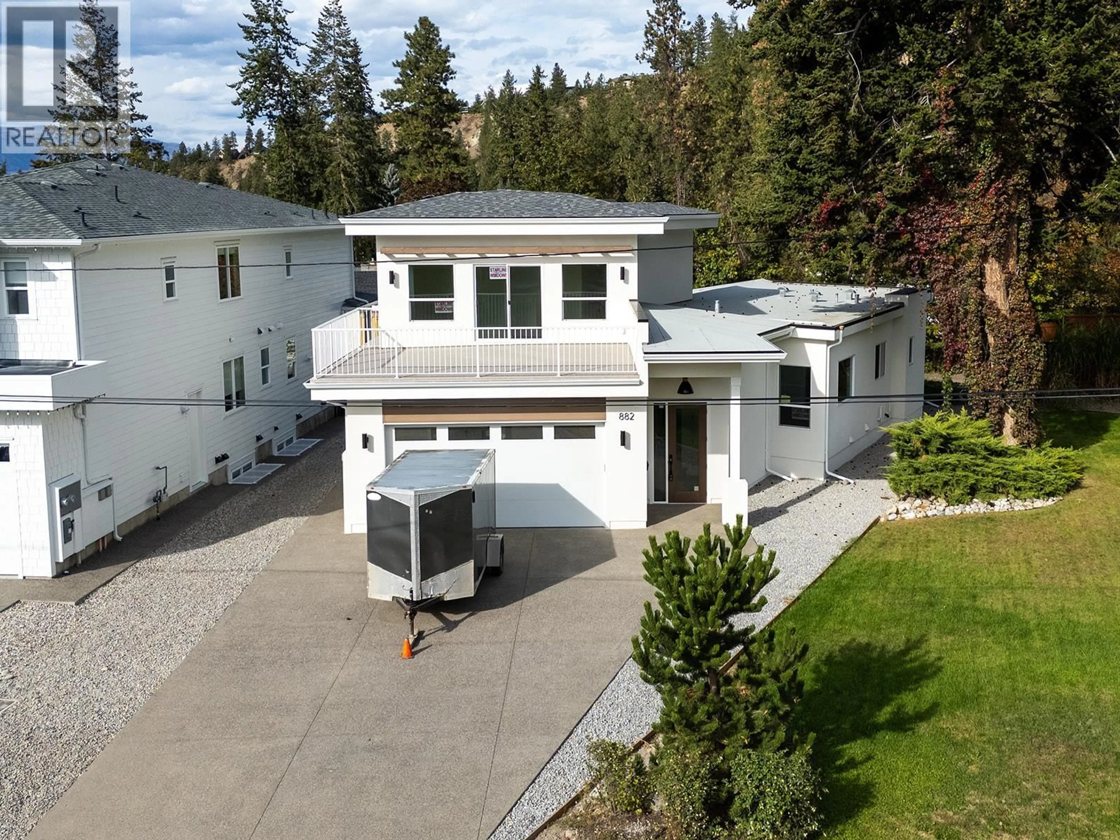 A pic from outside/outdoor area/front of a property/back of a property/a pic from drone, street for 882 HUBBARD ROAD, Kelowna British Columbia V1W1N9