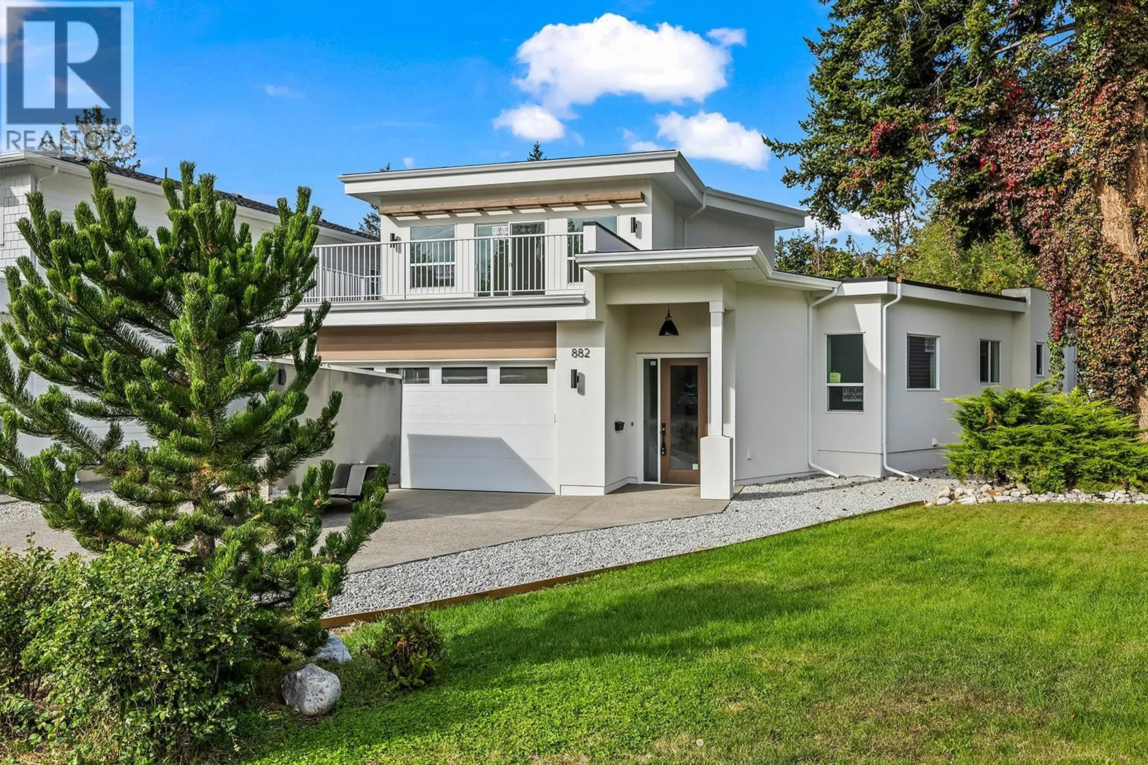 Home with vinyl exterior material, street for 882 HUBBARD ROAD, Kelowna British Columbia V1W1N9