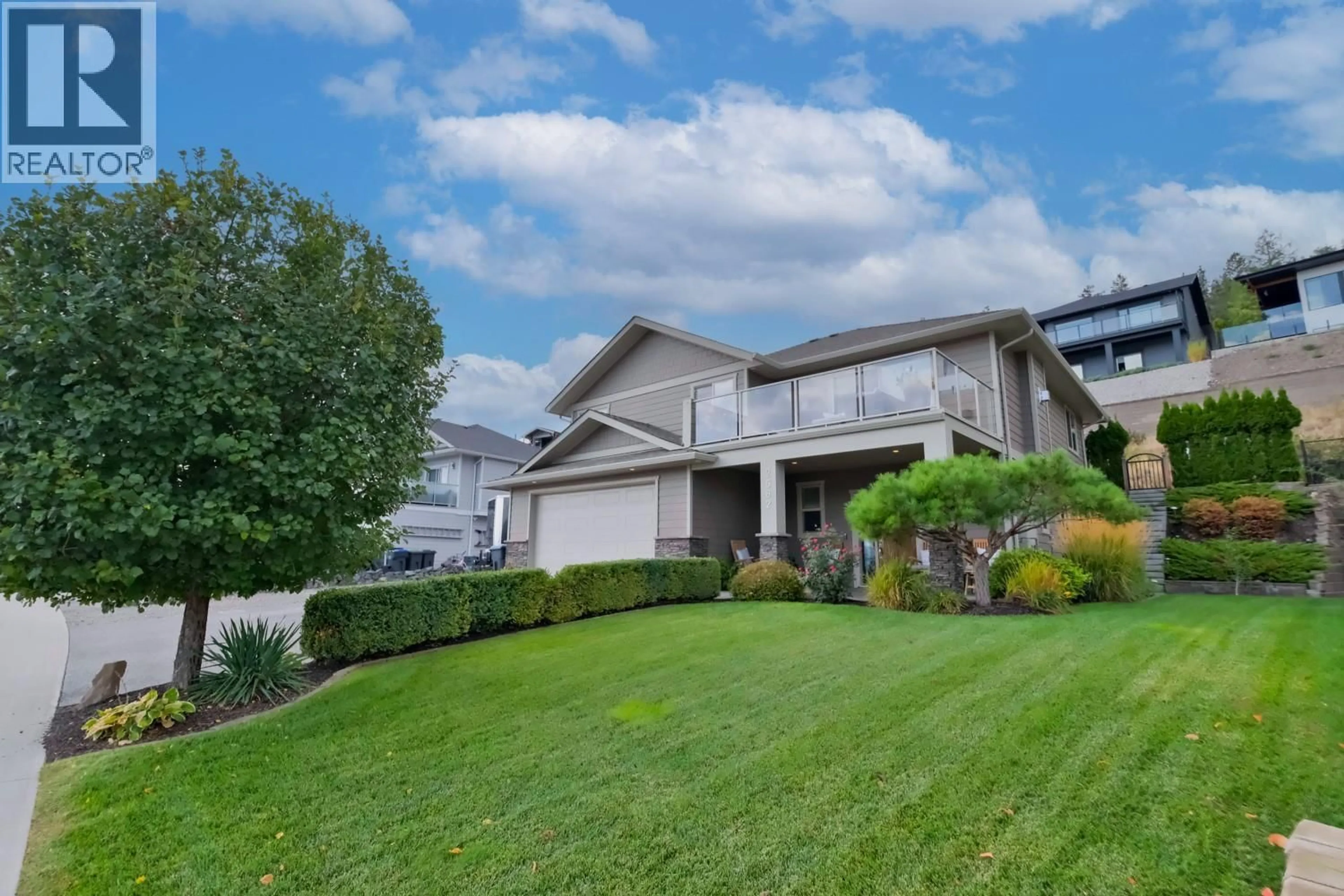 Home with vinyl exterior material, street for 2582 PARAMOUNT DRIVE, West Kelowna British Columbia V4T3H5
