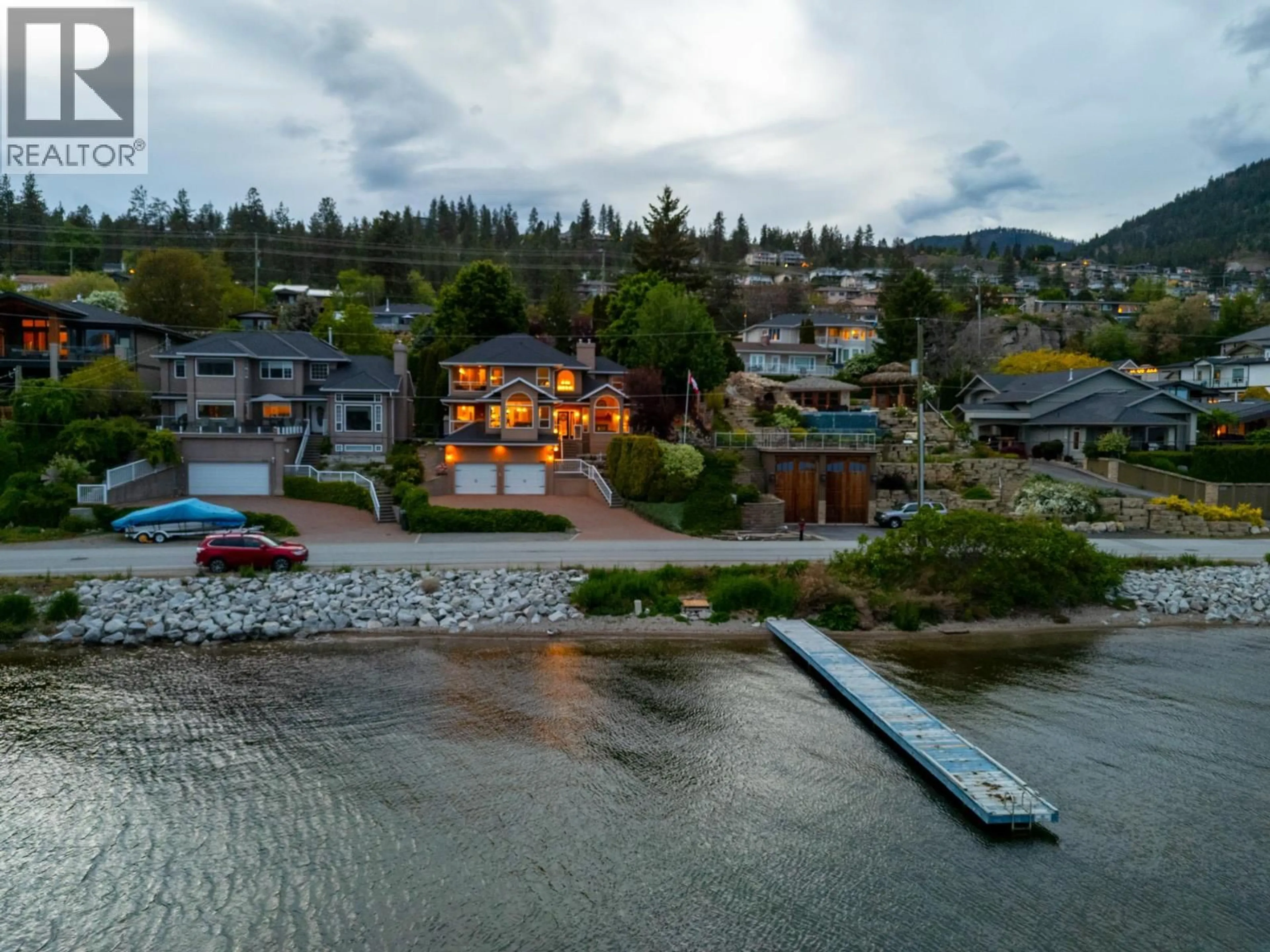 A pic from outside/outdoor area/front of a property/back of a property/a pic from drone, water/lake/river/ocean view for 3838 BEACH AVENUE, Peachland British Columbia V0H1X1
