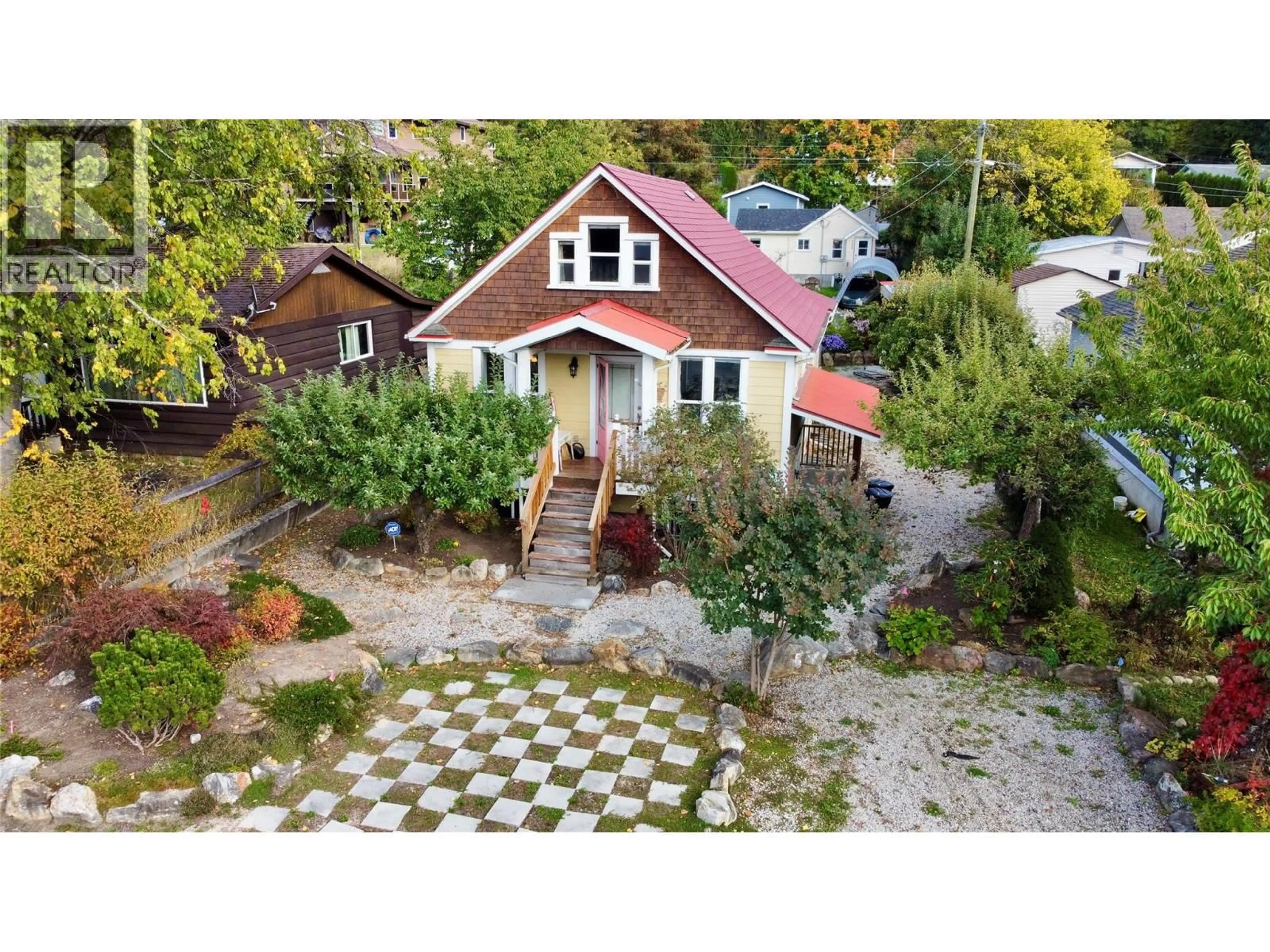 A pic from outside/outdoor area/front of a property/back of a property/a pic from drone, street for 305 1ST  NW AVENUE, Nakusp British Columbia V0G1R0