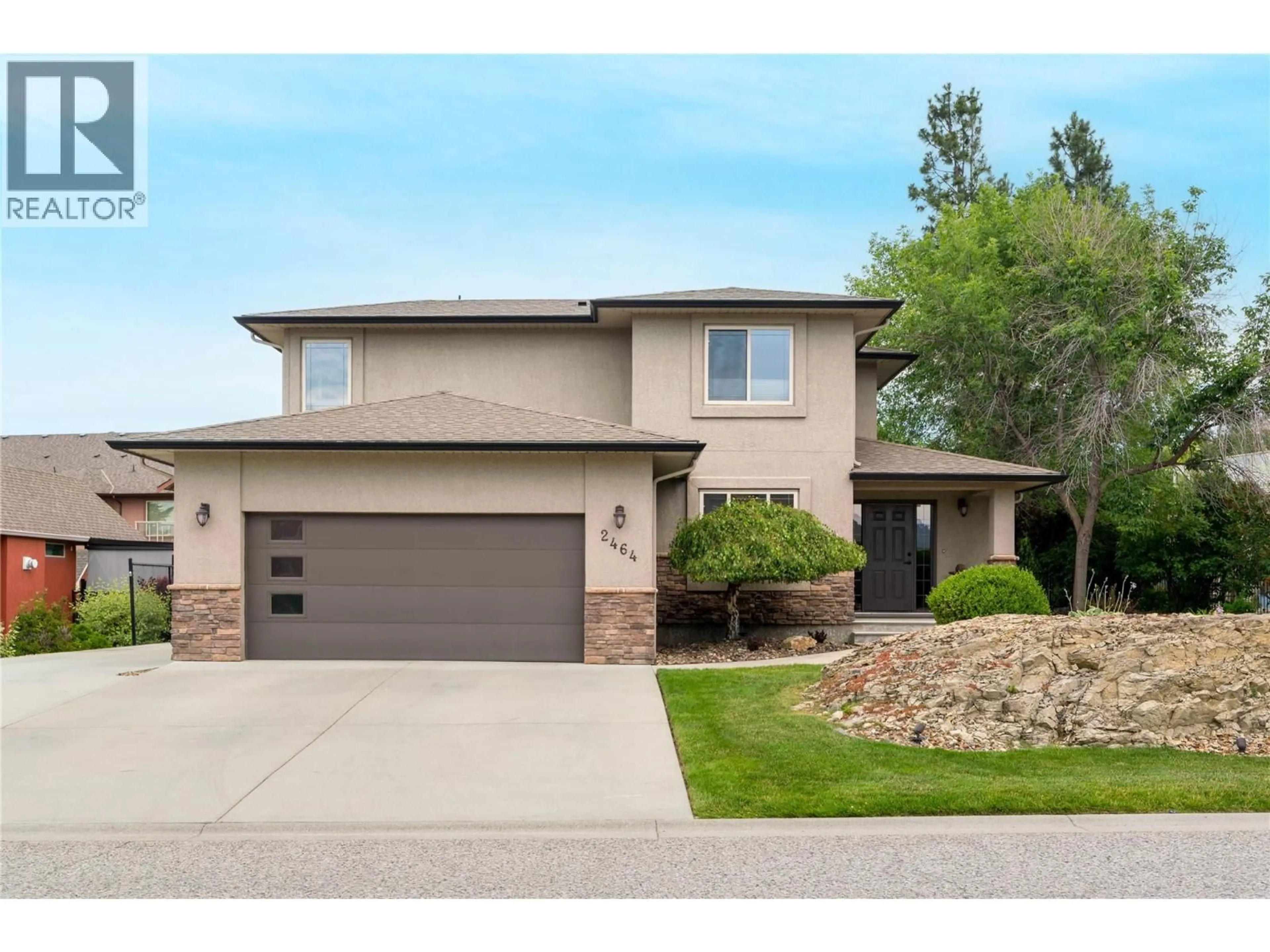 Home with brick exterior material, street for 2464 SELKIRK DRIVE, Kelowna British Columbia V1V2R7